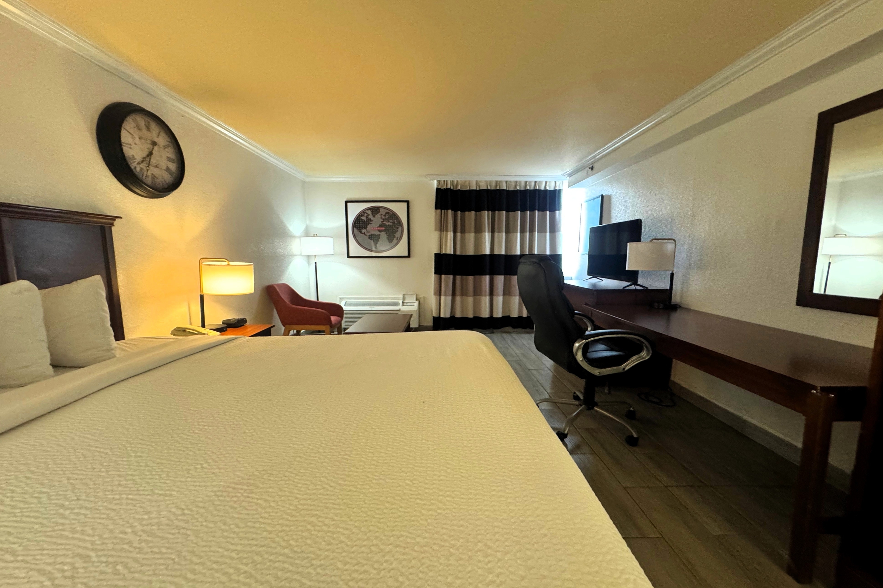 Guest room at the Ramada by Wyndham Birmingham Airport in Birmingham, Alabama