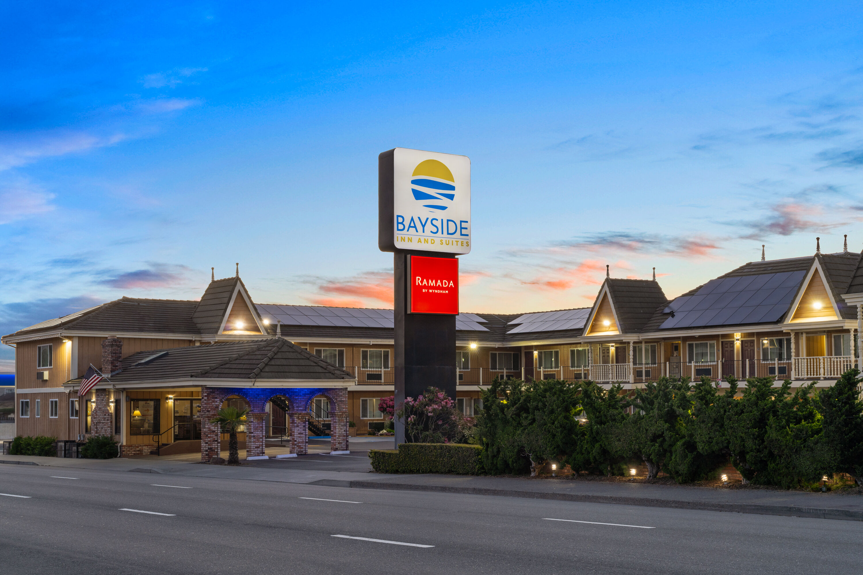 Exterior Dusk Image of Ramada Bayside Inn & Suites Eureka hotel in Eureka, California