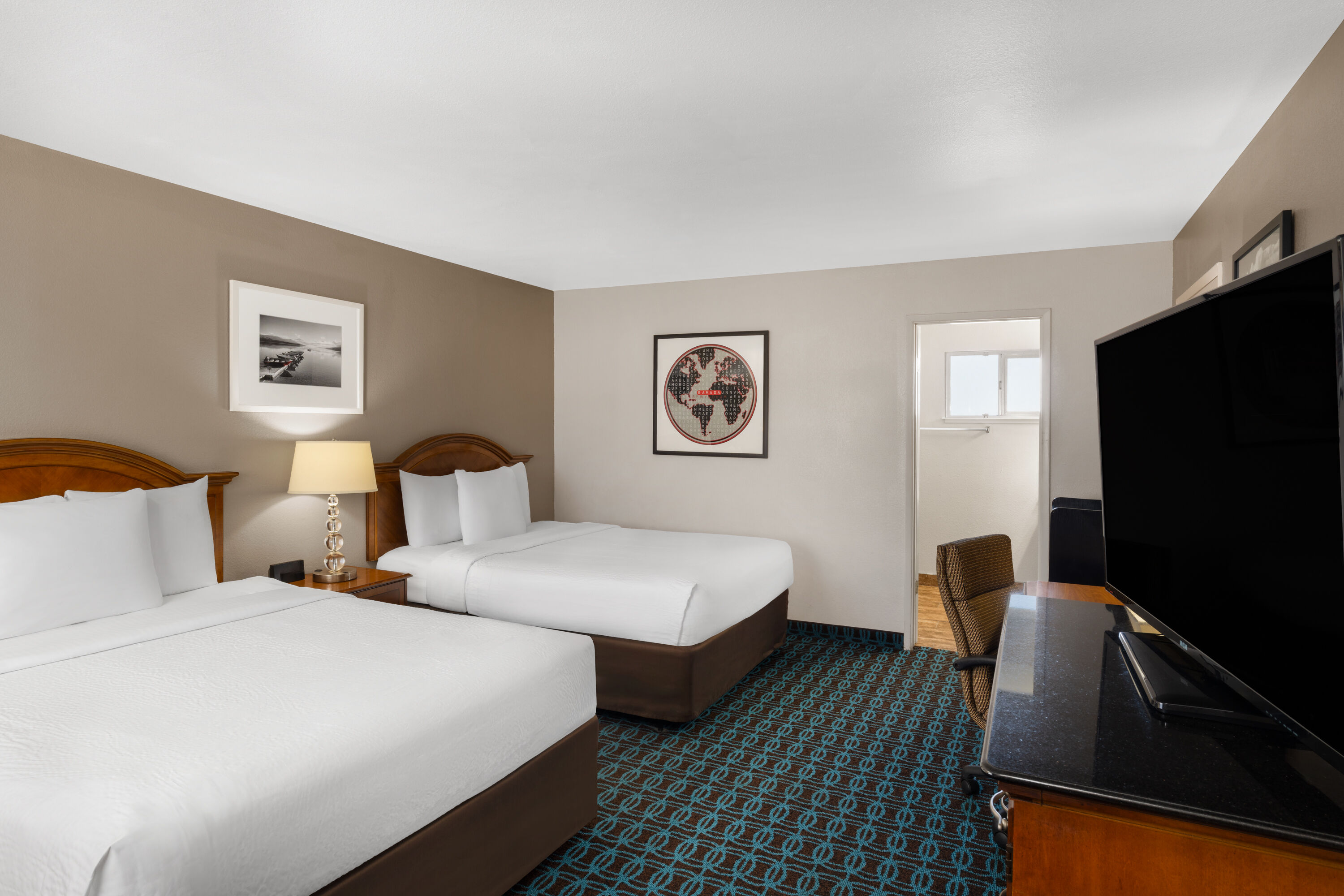 Guest room at the Ramada Bayside Inn & Suites Eureka in Eureka, California