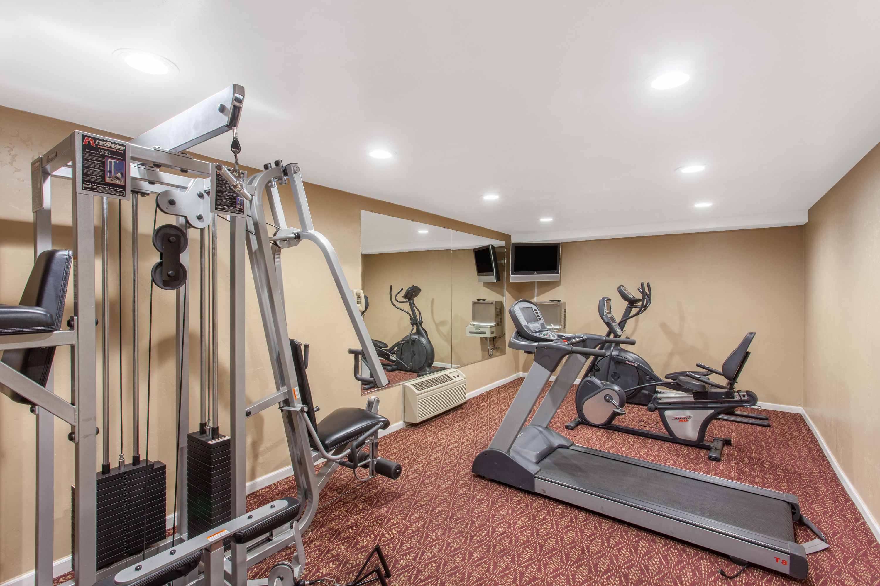 Fitness room at Ramada by Wyndham Fresno North in Fresno, California