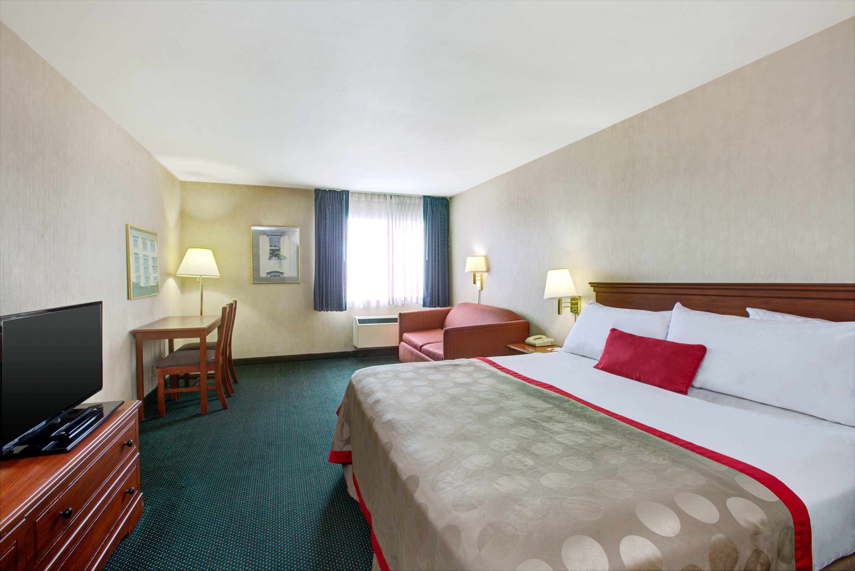 Guest room at the Ramada by Wyndham Hawthorne/LA Stadium in Hawthorne, California