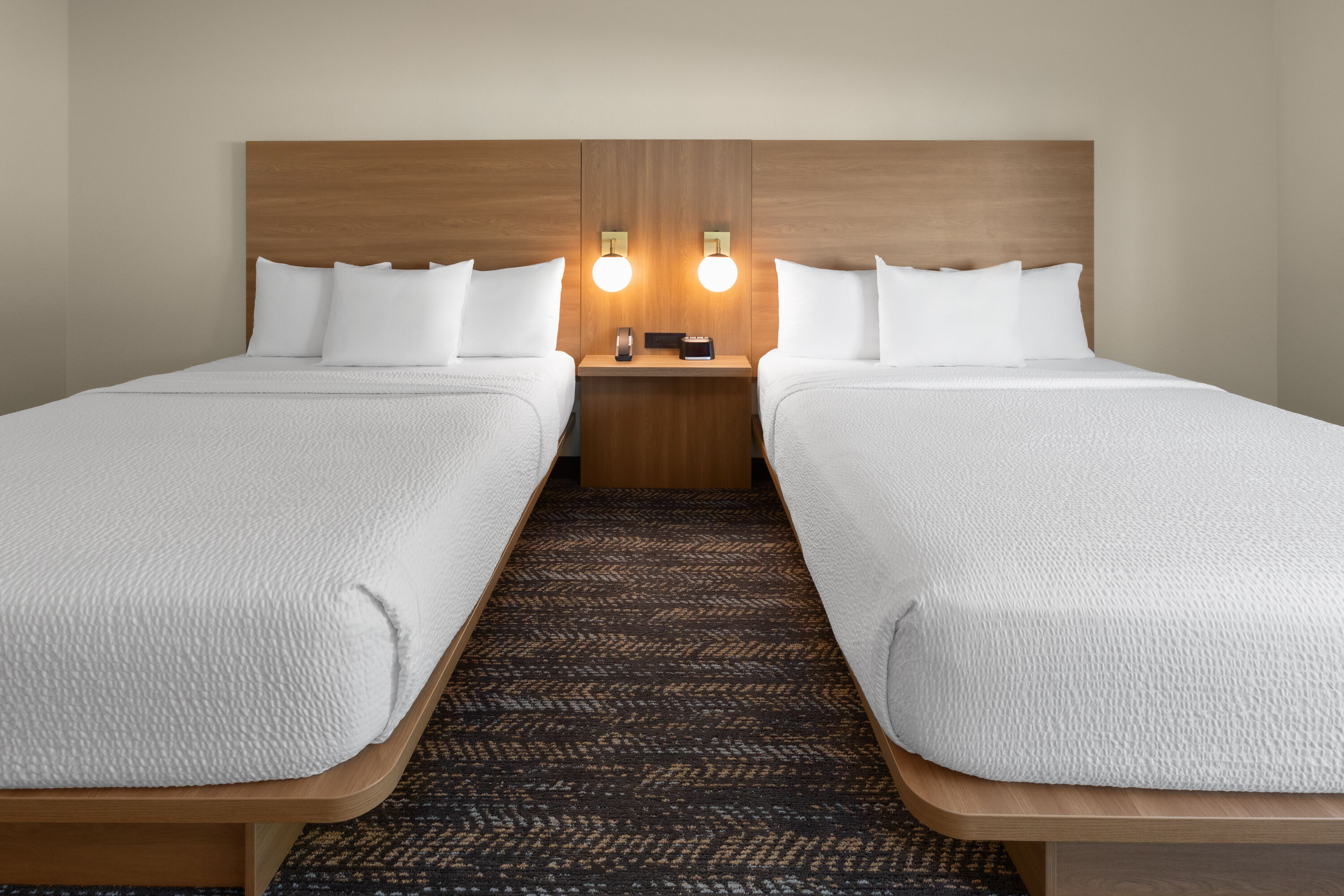 Guest room at the Ramada by Wyndham Merced in Merced, California