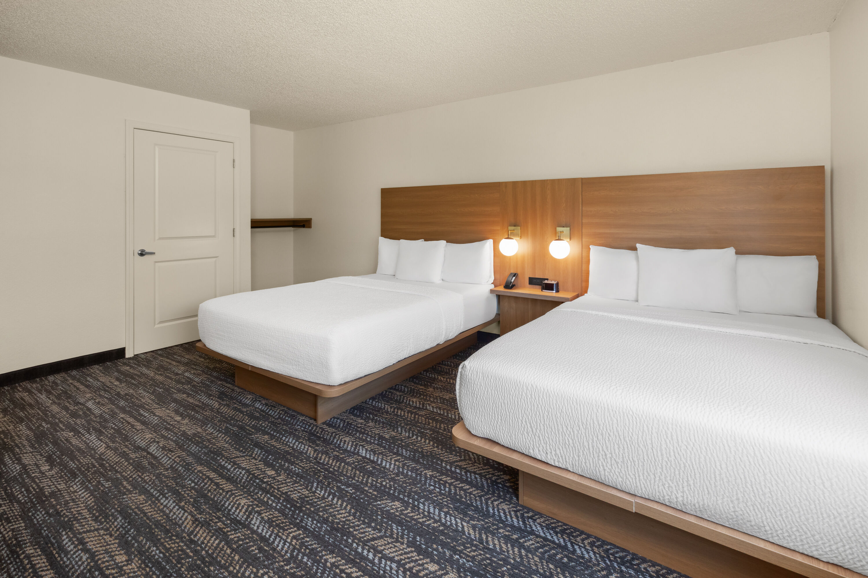 Guest room at the Ramada by Wyndham Merced in Merced, California