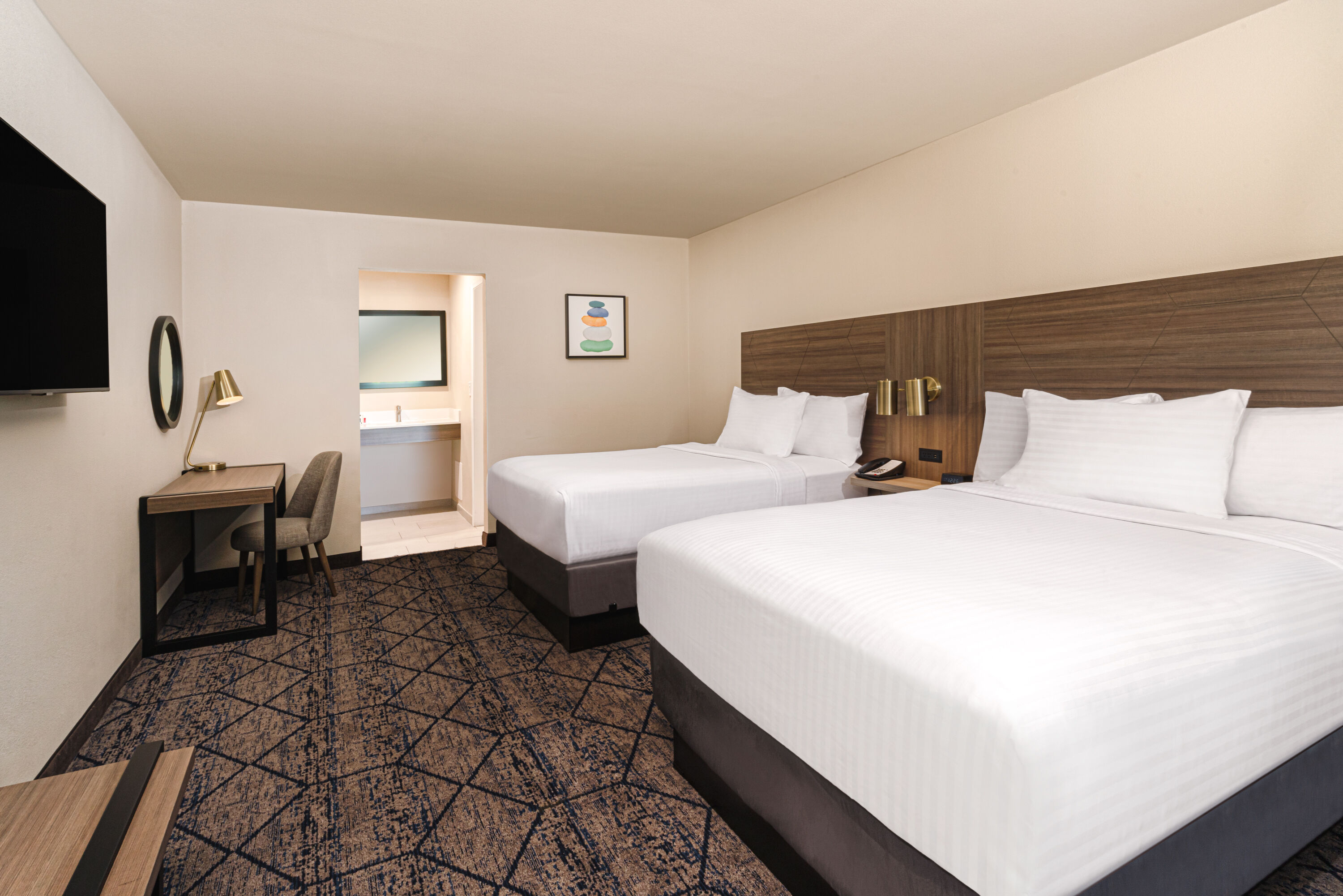 Guest room at the Ramada by Wyndham Modesto Yosemite Area in Modesto, California