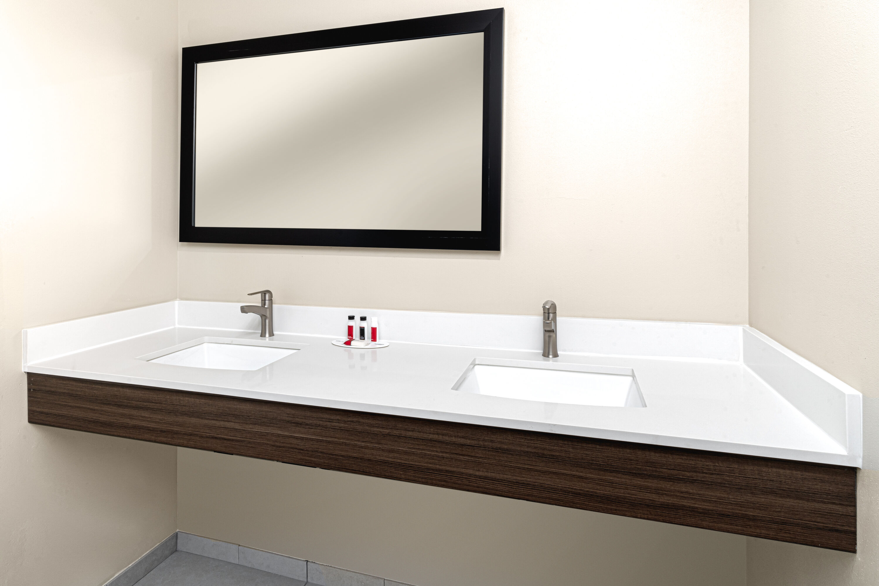 Guest room bath at the Ramada by Wyndham Modesto Yosemite Area in Modesto, California