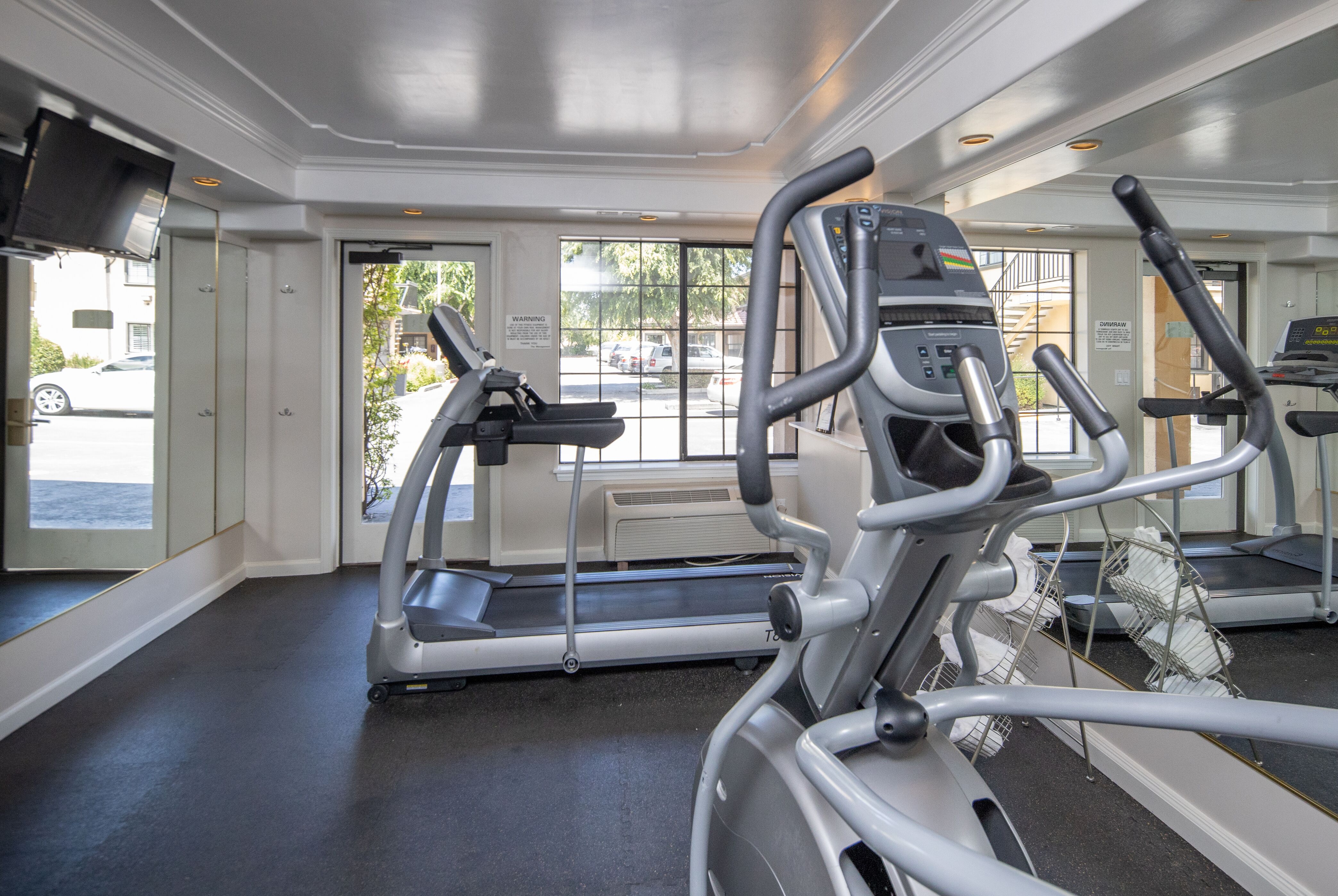 Fitness room at Ramada by Wyndham Mountain View in Mountain View, California