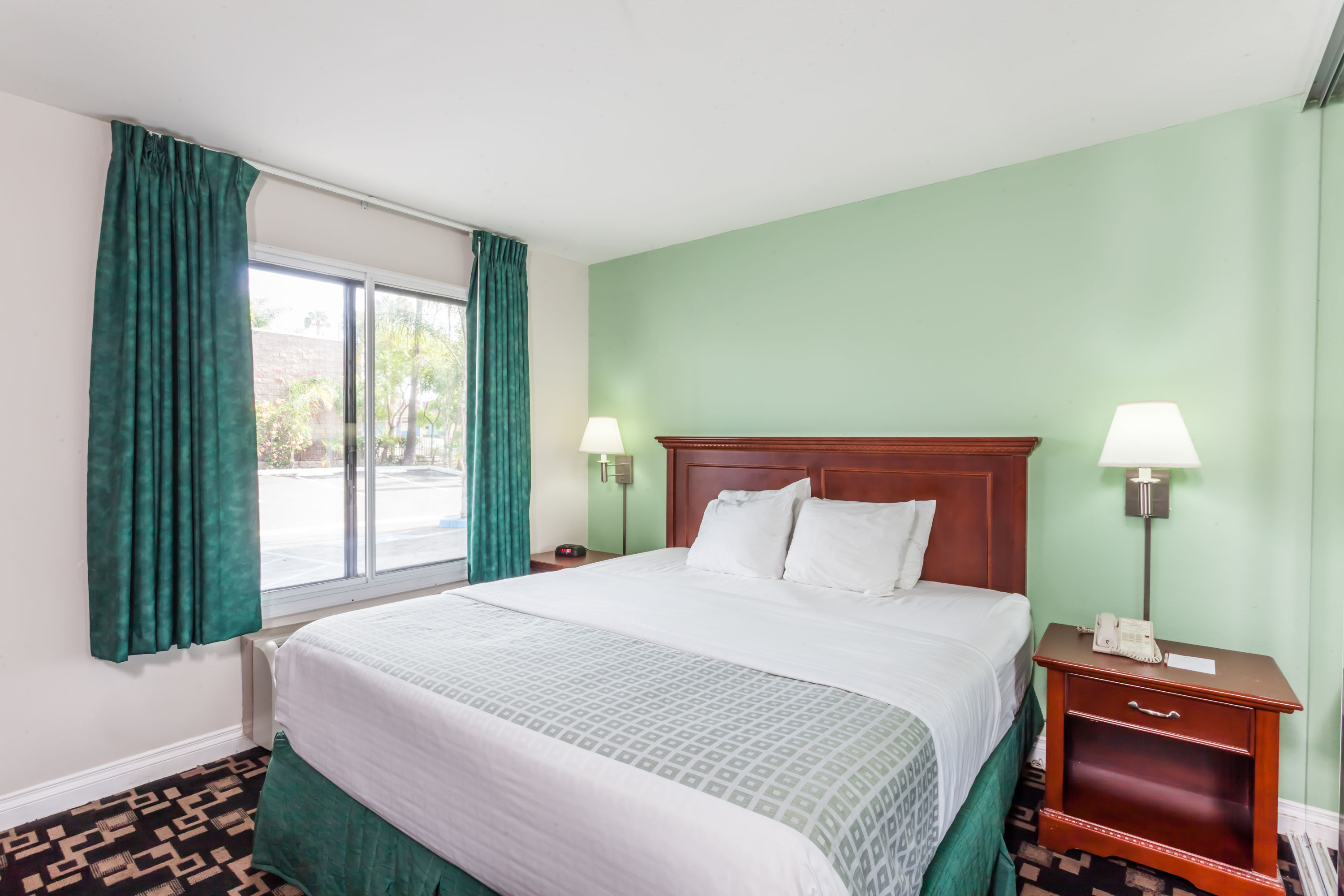 Guest room at the Ramada by Wyndham Oceanside in Oceanside, California