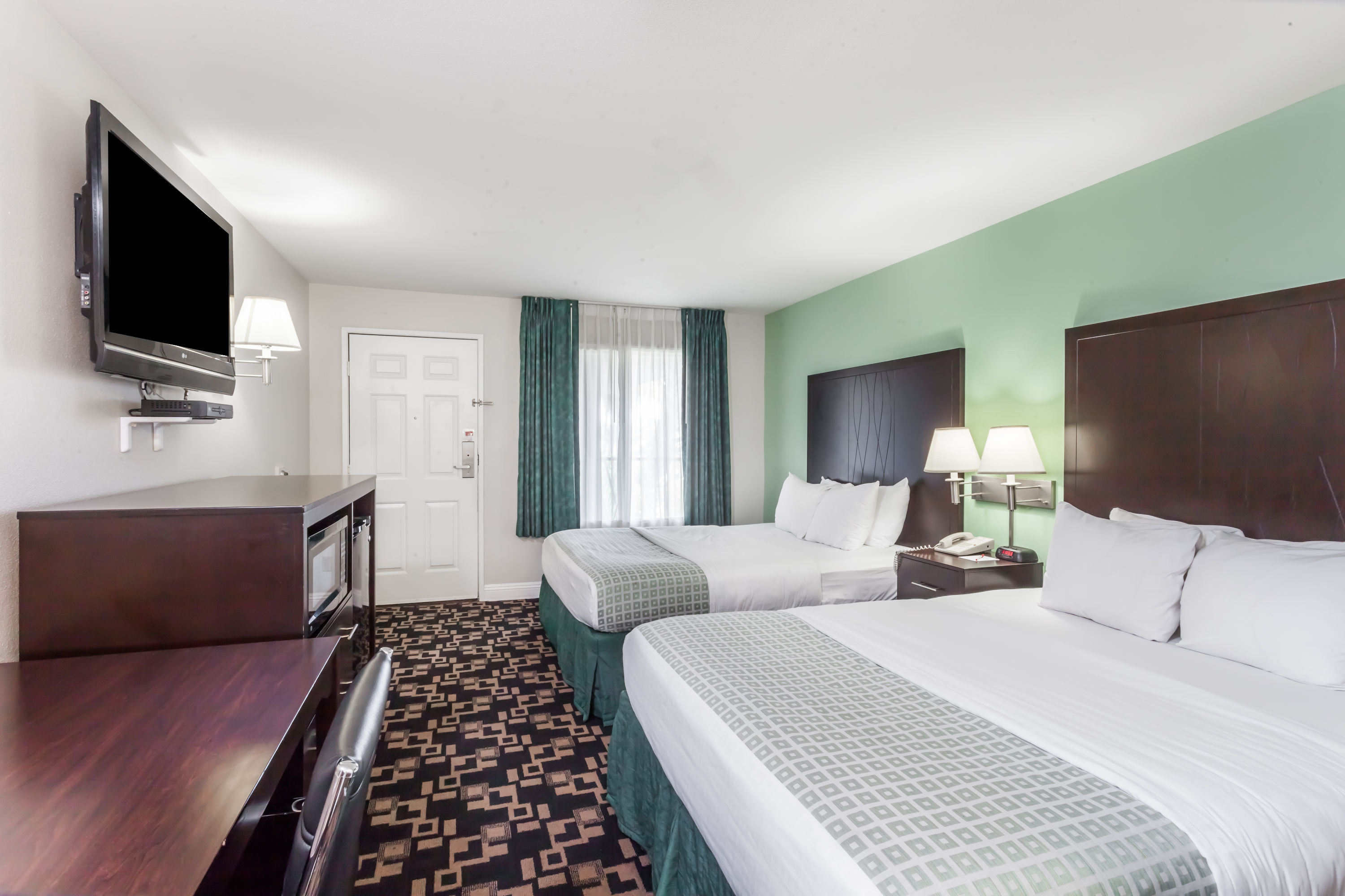 Guest room at the Ramada by Wyndham Oceanside in Oceanside, California