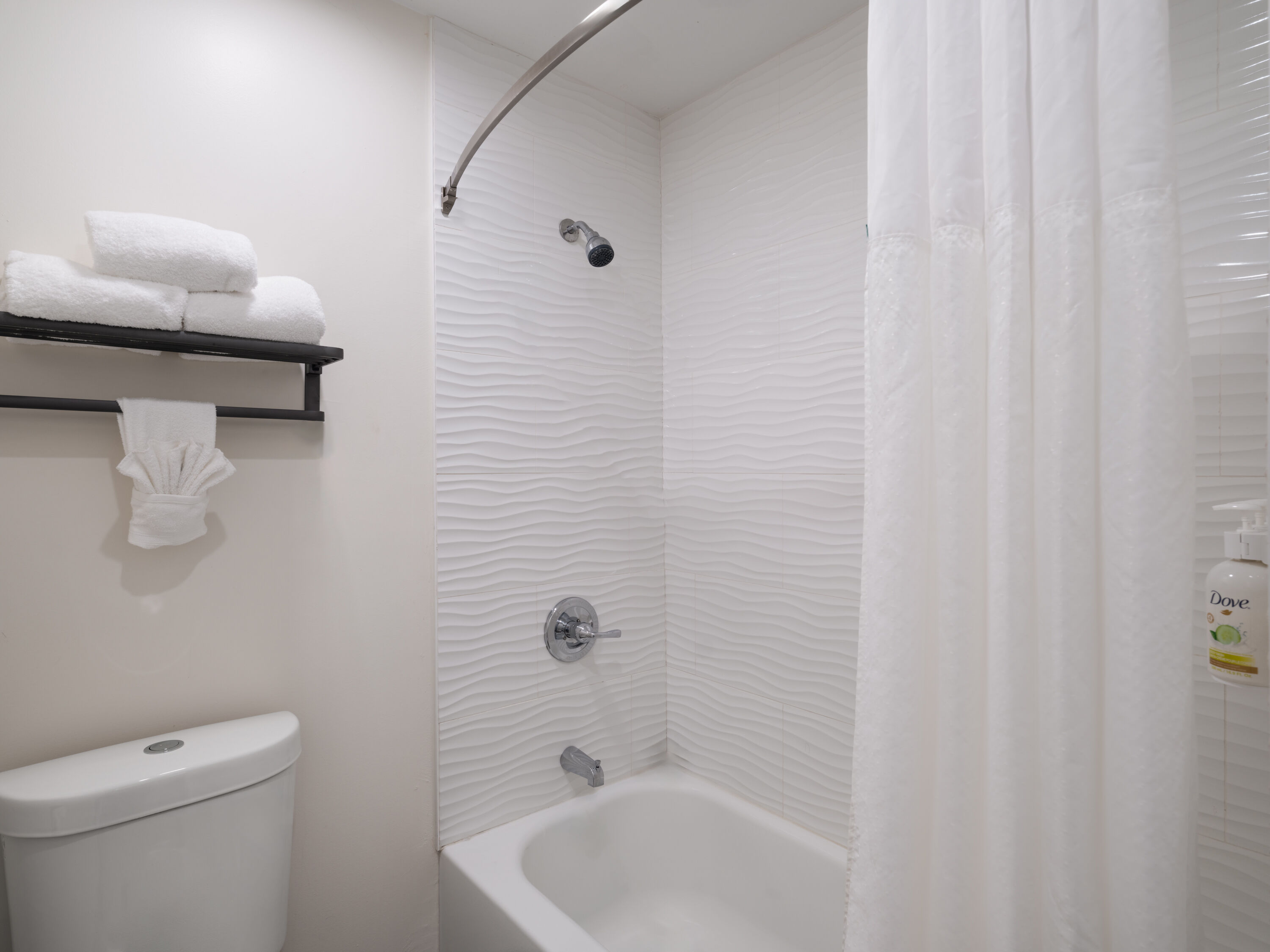 Guest room bath at the Ramada by Wyndham San Diego Poway Miramar in Poway, California