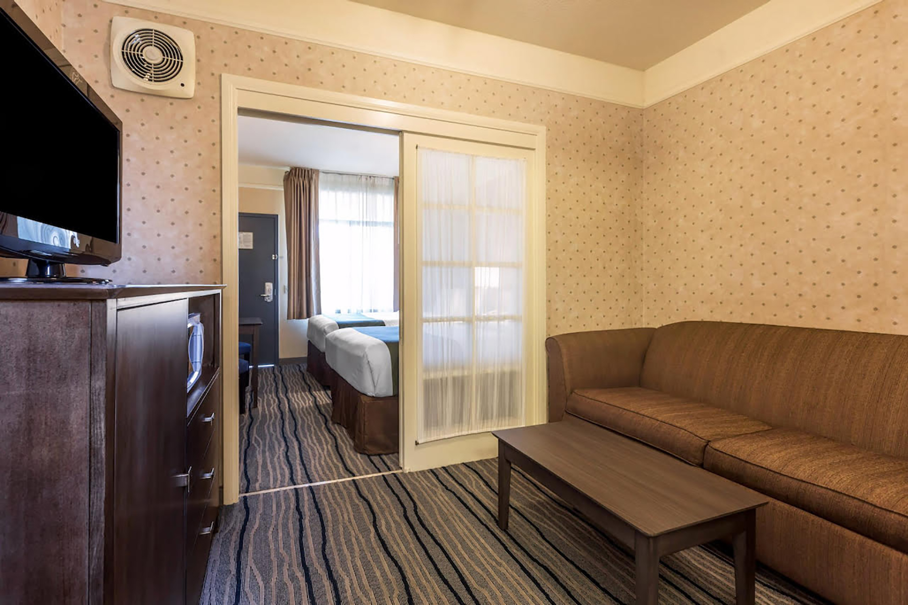 Guest room at the Ramada Suites by Wyndham San Diego/Hotel Circle Area in San Diego, California