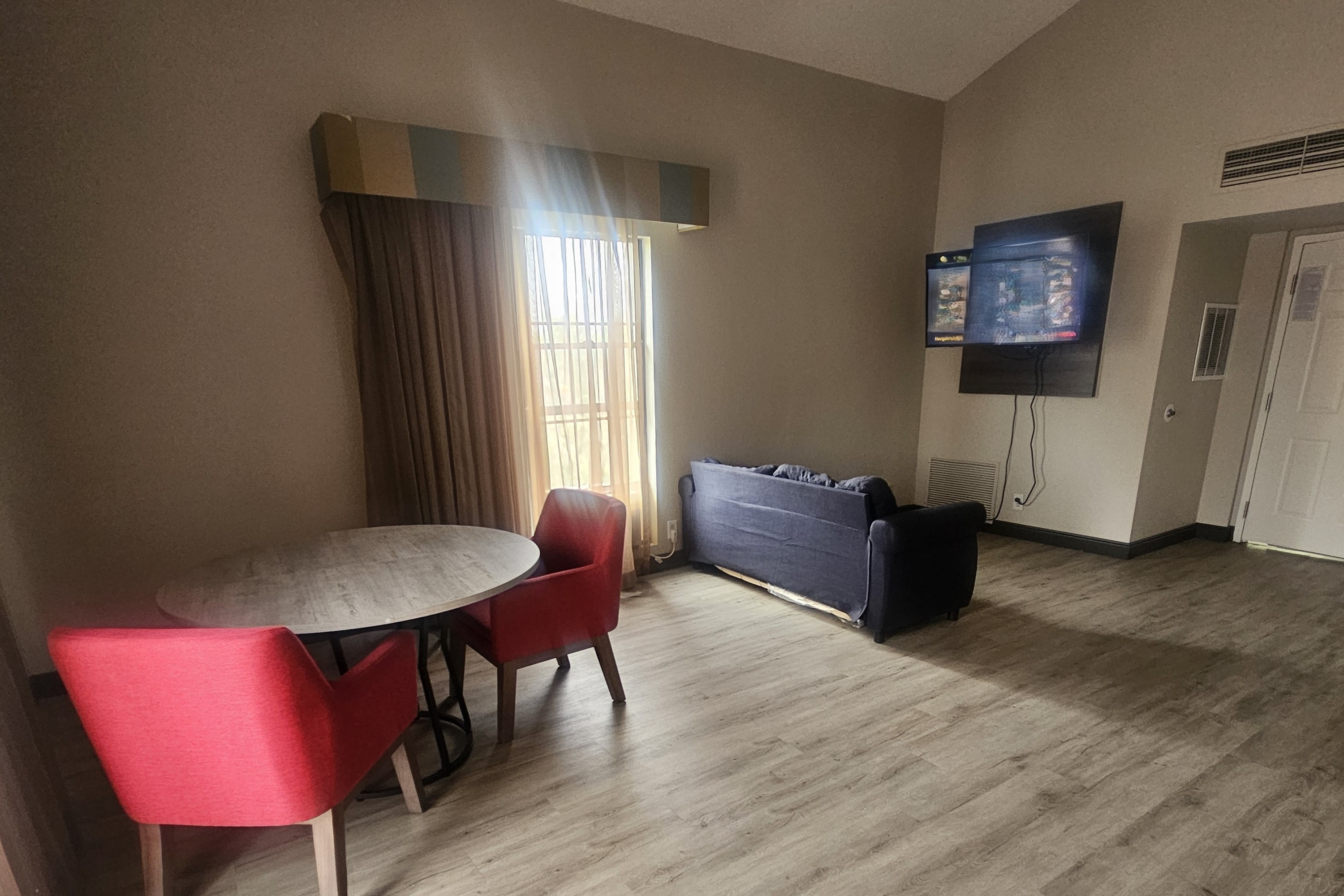 Guest room at the Ramada by Wyndham Westminster Denver in Westminster, Colorado