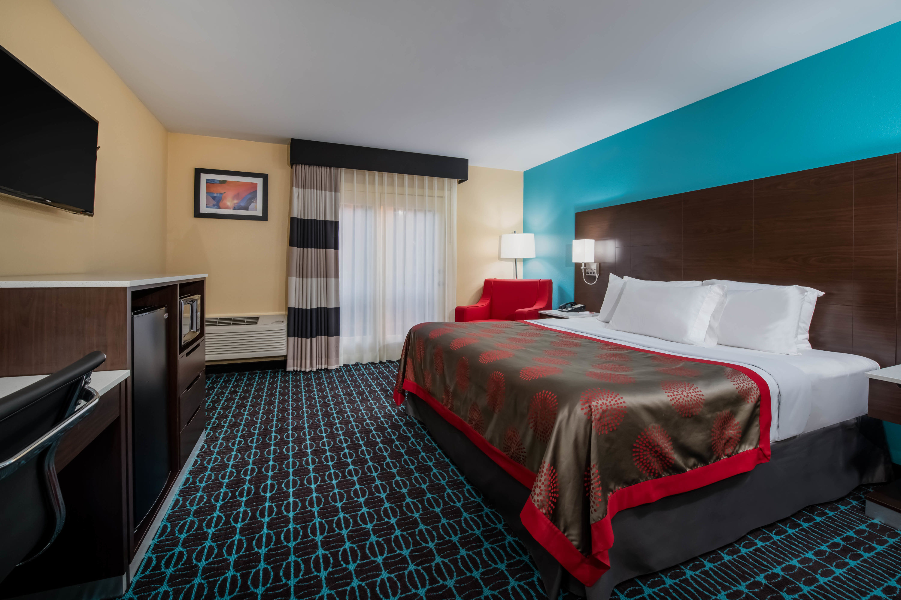 Guest room at the Ramada by Wyndham Groton/Mystic in Groton, Connecticut