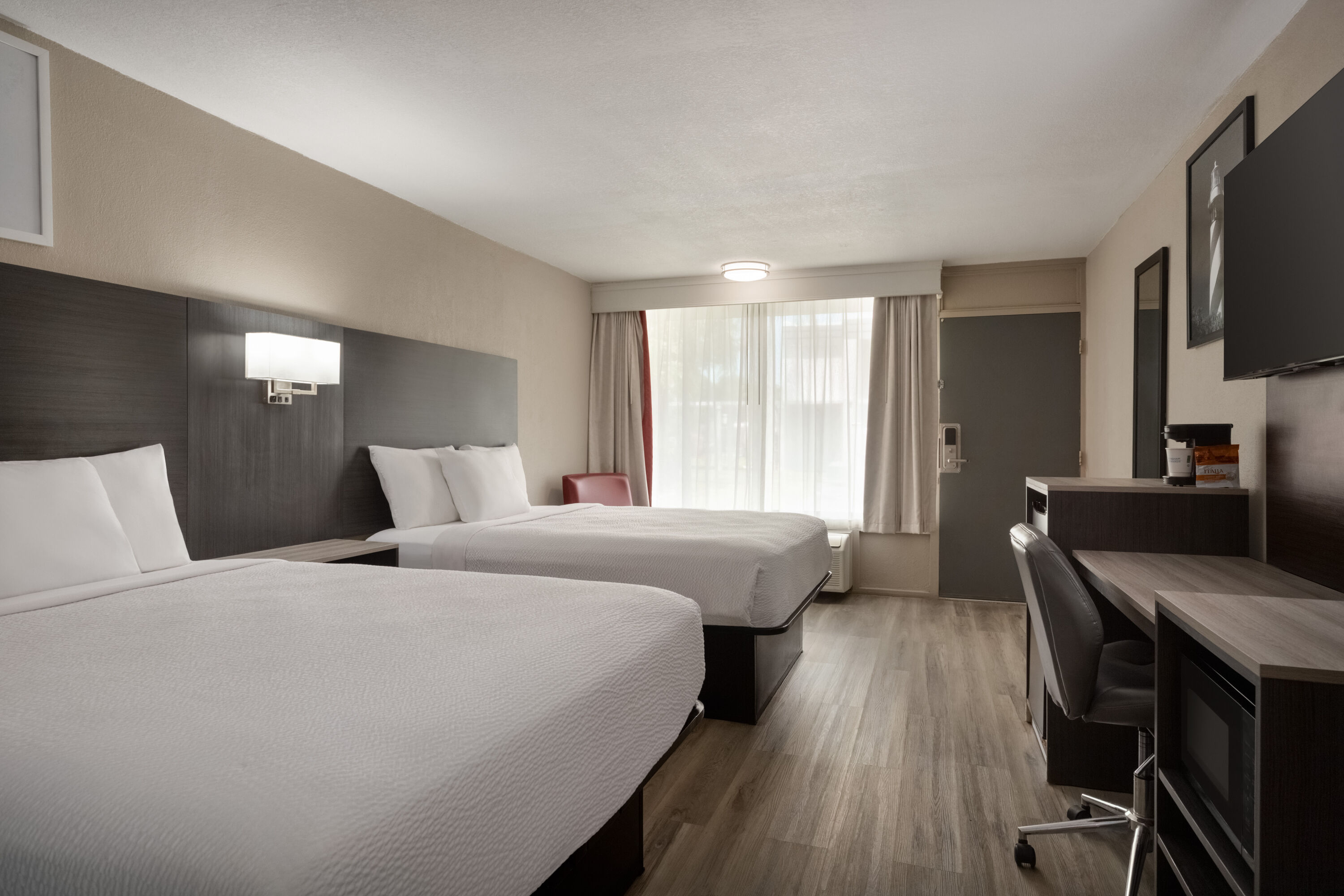 Guest room at the Ramada by Wyndham Cocoa in Cocoa, Florida