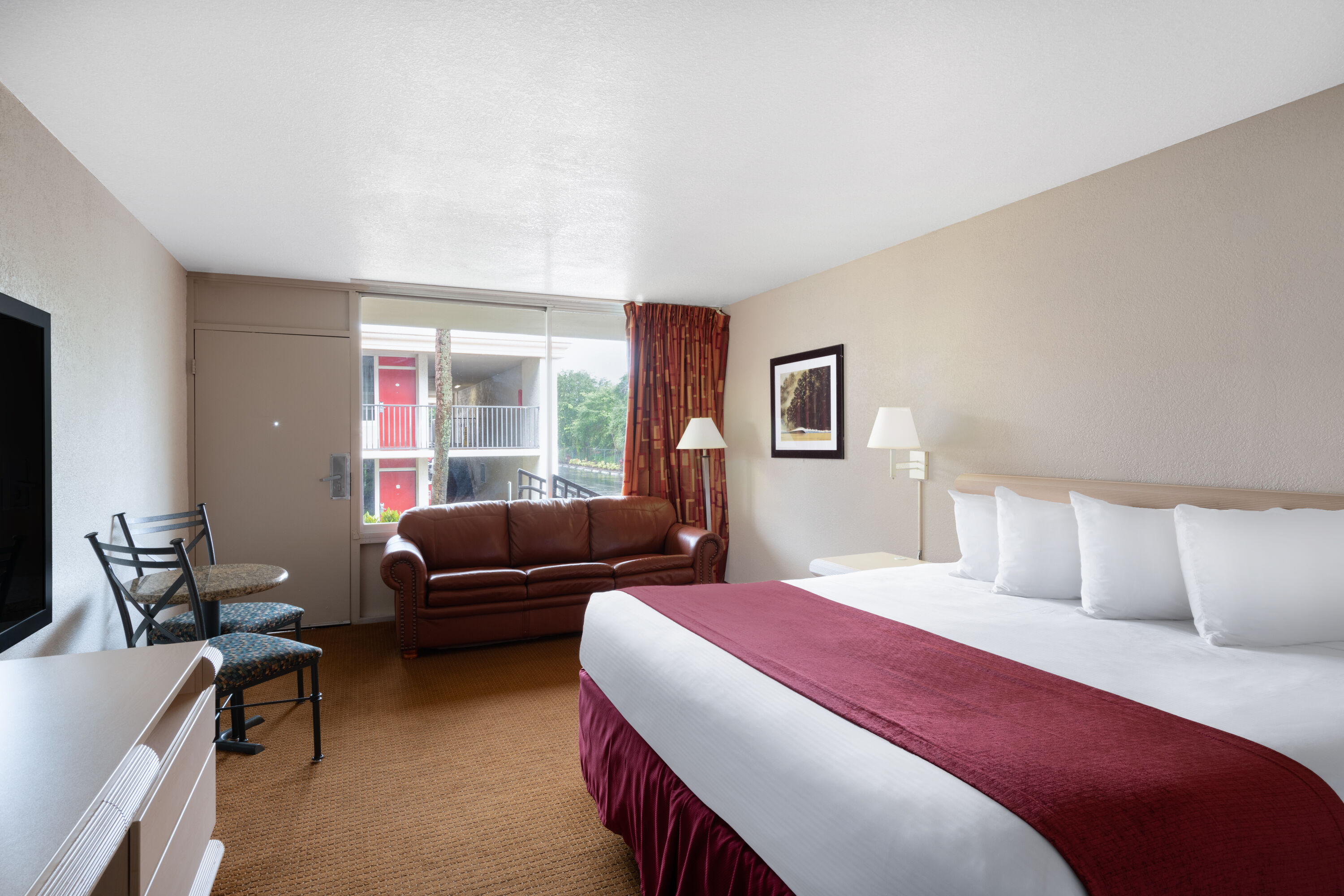 Guest room at the Ramada by Wyndham Kissimmee Gateway in Kissimmee, Florida