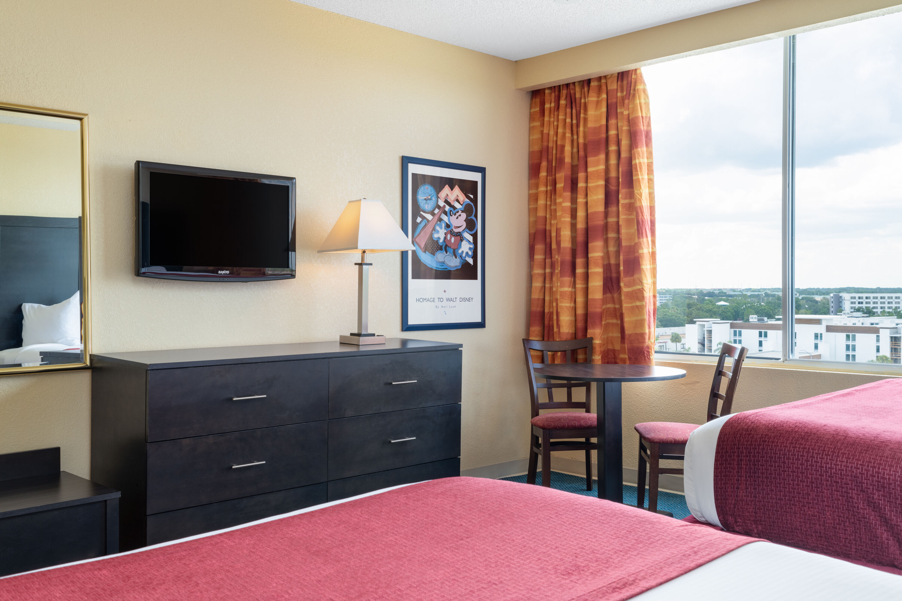 Guest room at the Ramada by Wyndham Kissimmee Gateway in Kissimmee, Florida