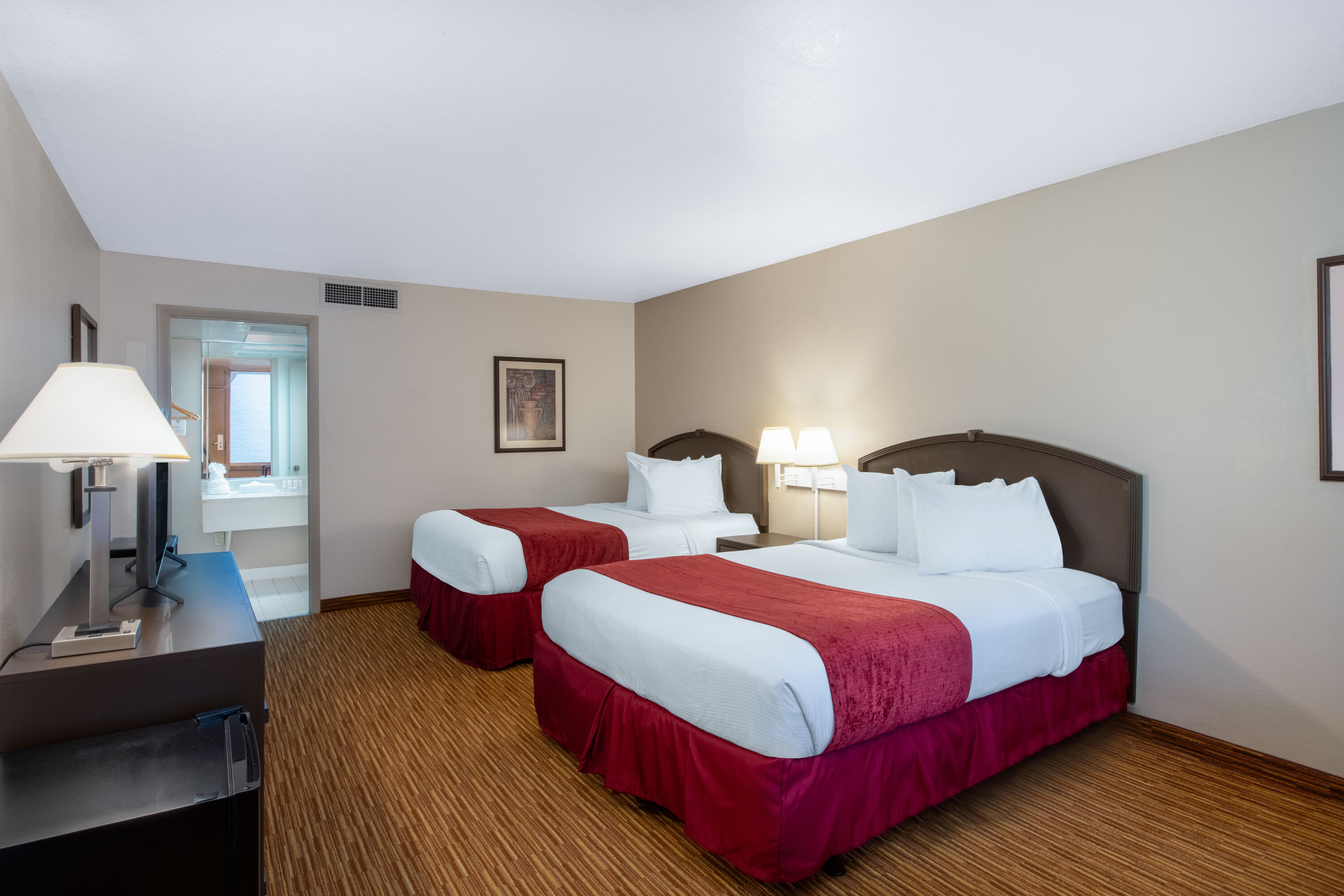 Guest room at the Ramada by Wyndham Kissimmee Gateway in Kissimmee, Florida
