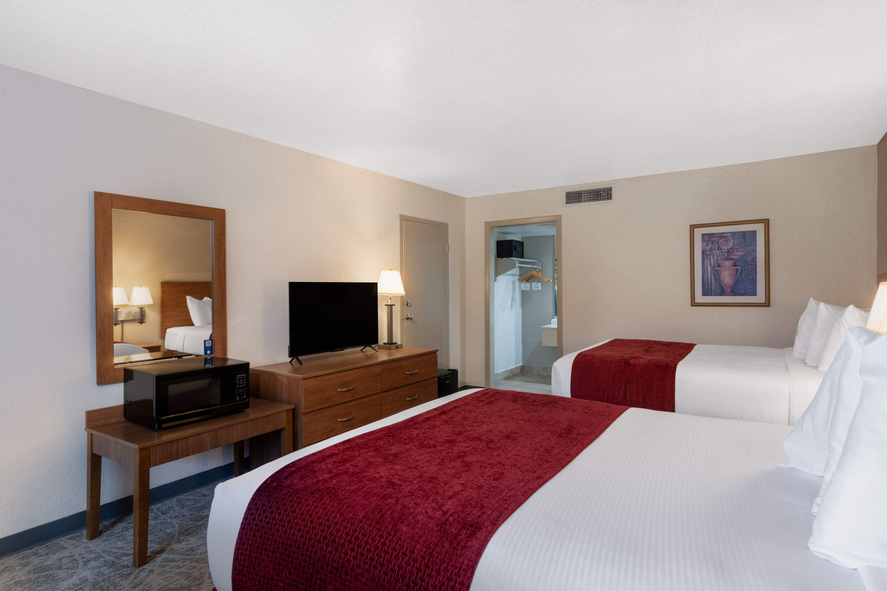 Guest room at the Ramada by Wyndham Kissimmee Gateway in Kissimmee, Florida