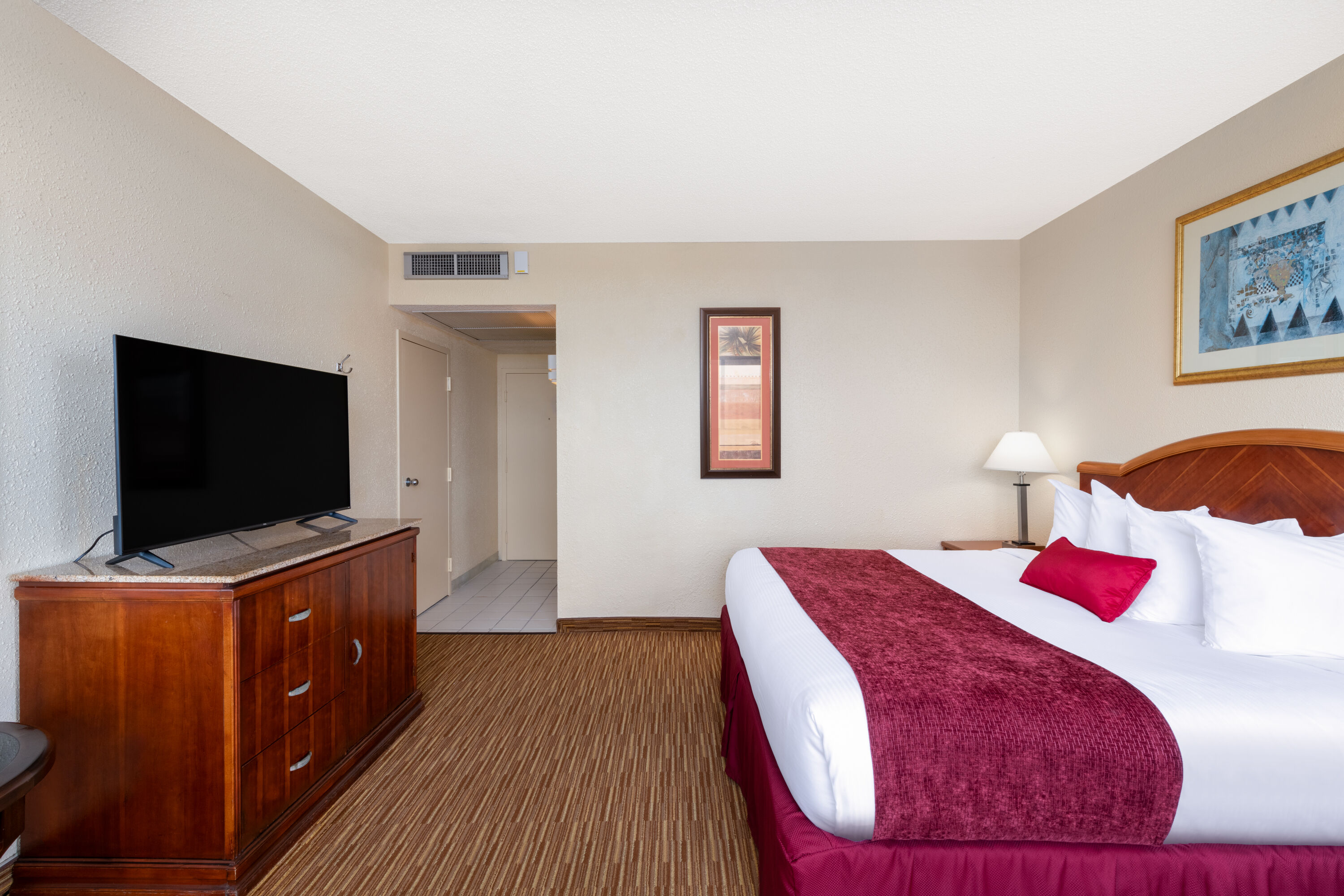 Guest room at the Ramada by Wyndham Kissimmee Gateway in Kissimmee, Florida