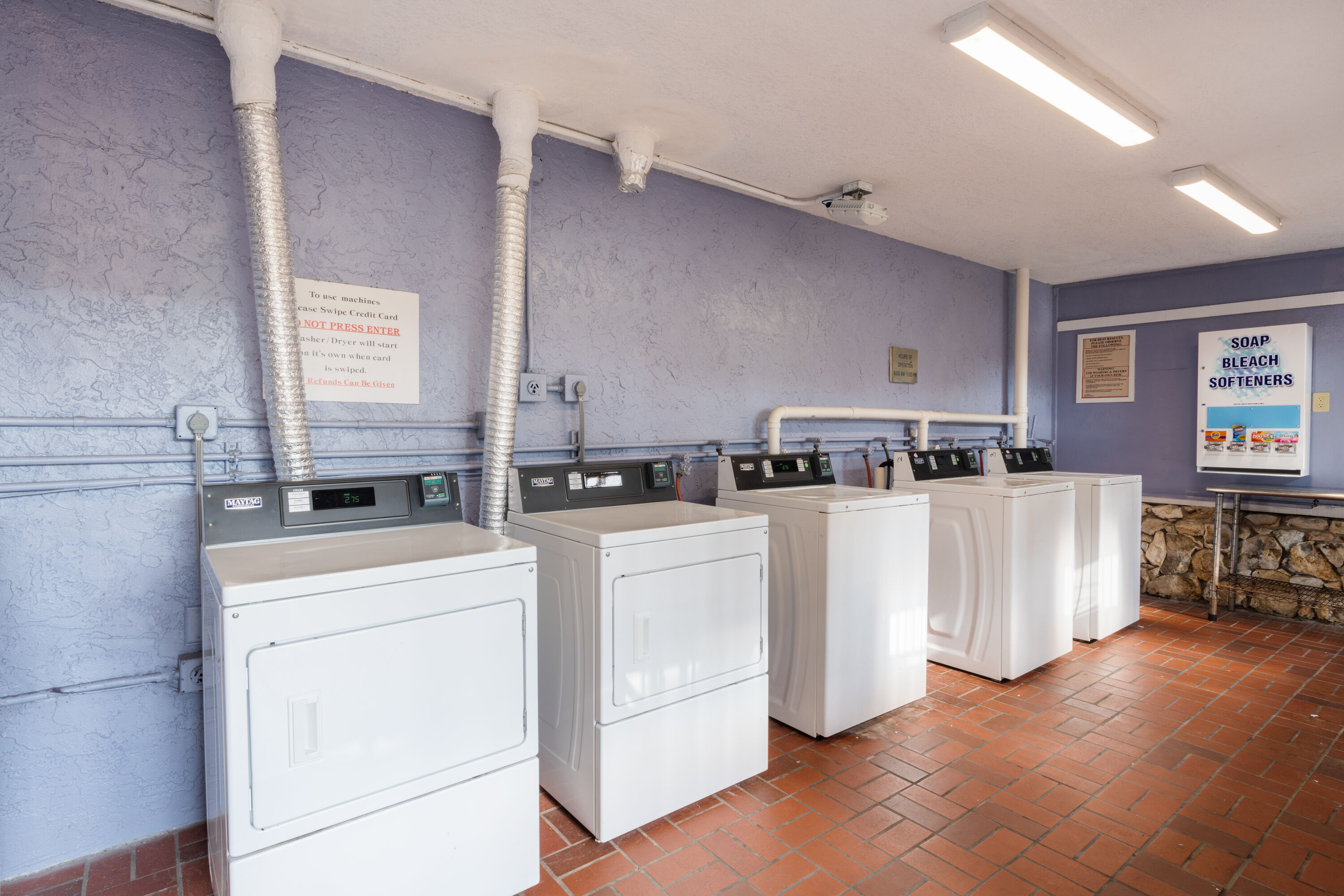 Laundry facilities at Ramada by Wyndham Kissimmee Gateway in Kissimmee, Florida