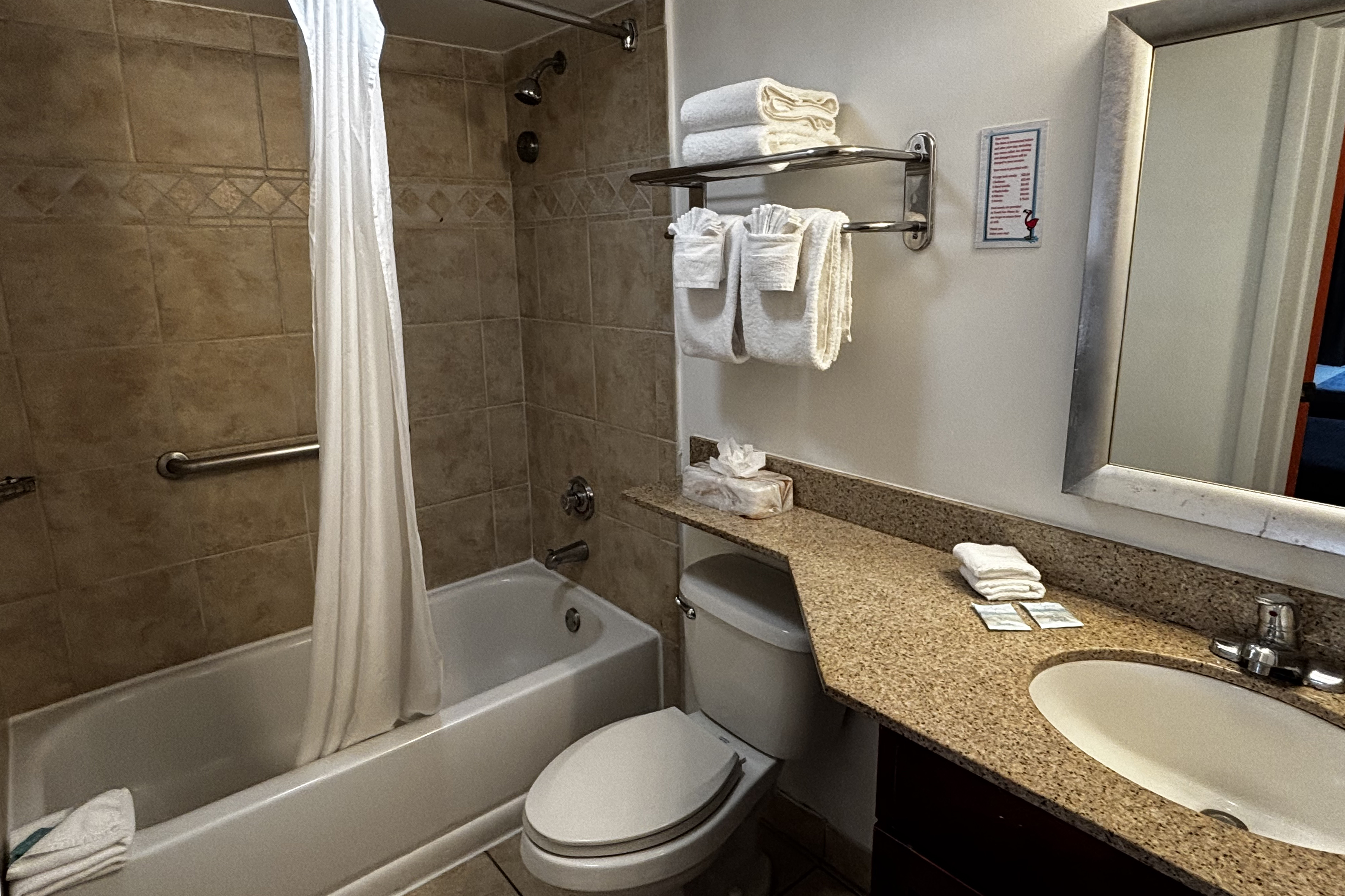 Guest room bath at the Ramada by Wyndham Hotel & Water Park in Kissimmee, Florida