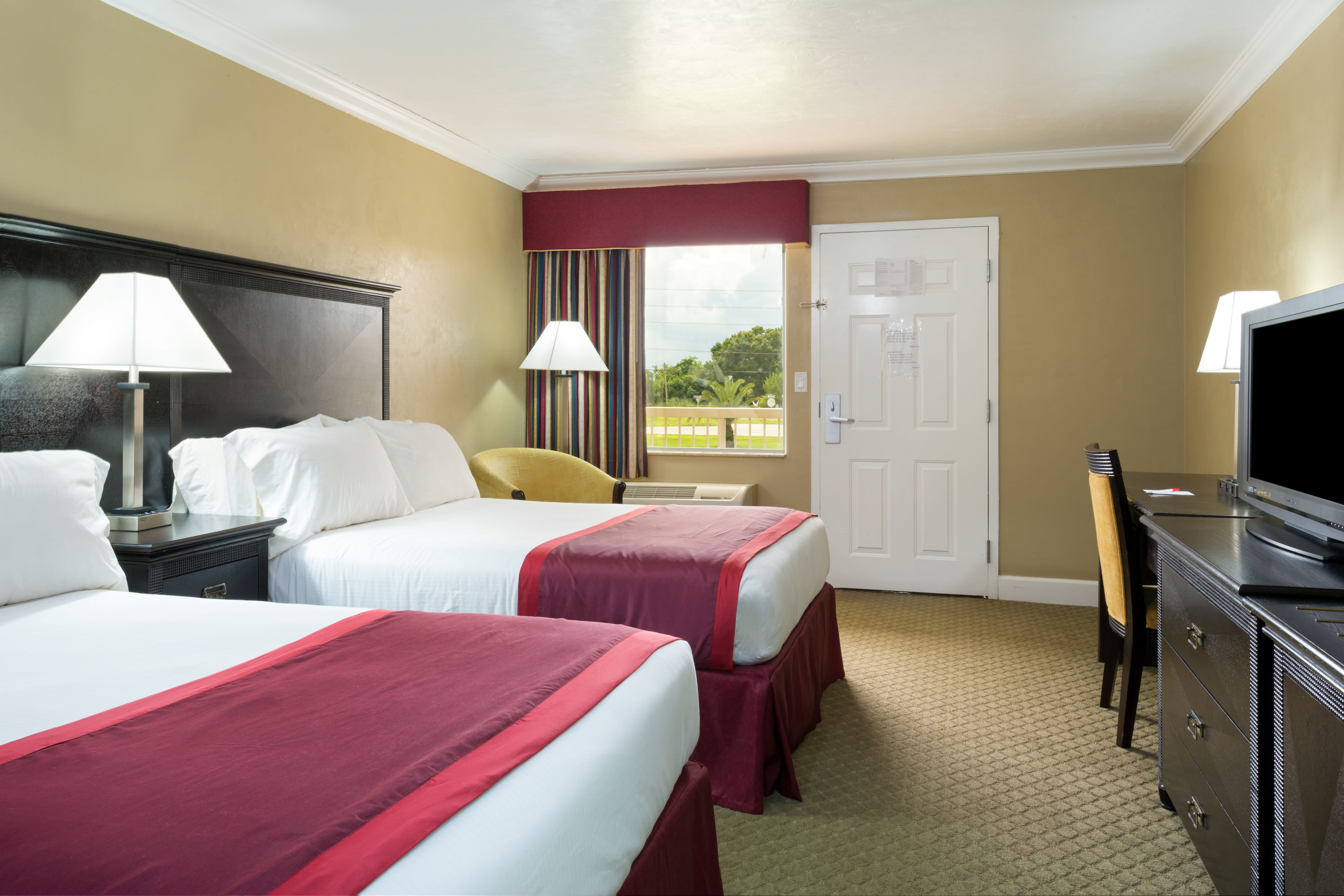 Guest room at the Ramada by Wyndham Lake Placid in Lake Placid, Florida