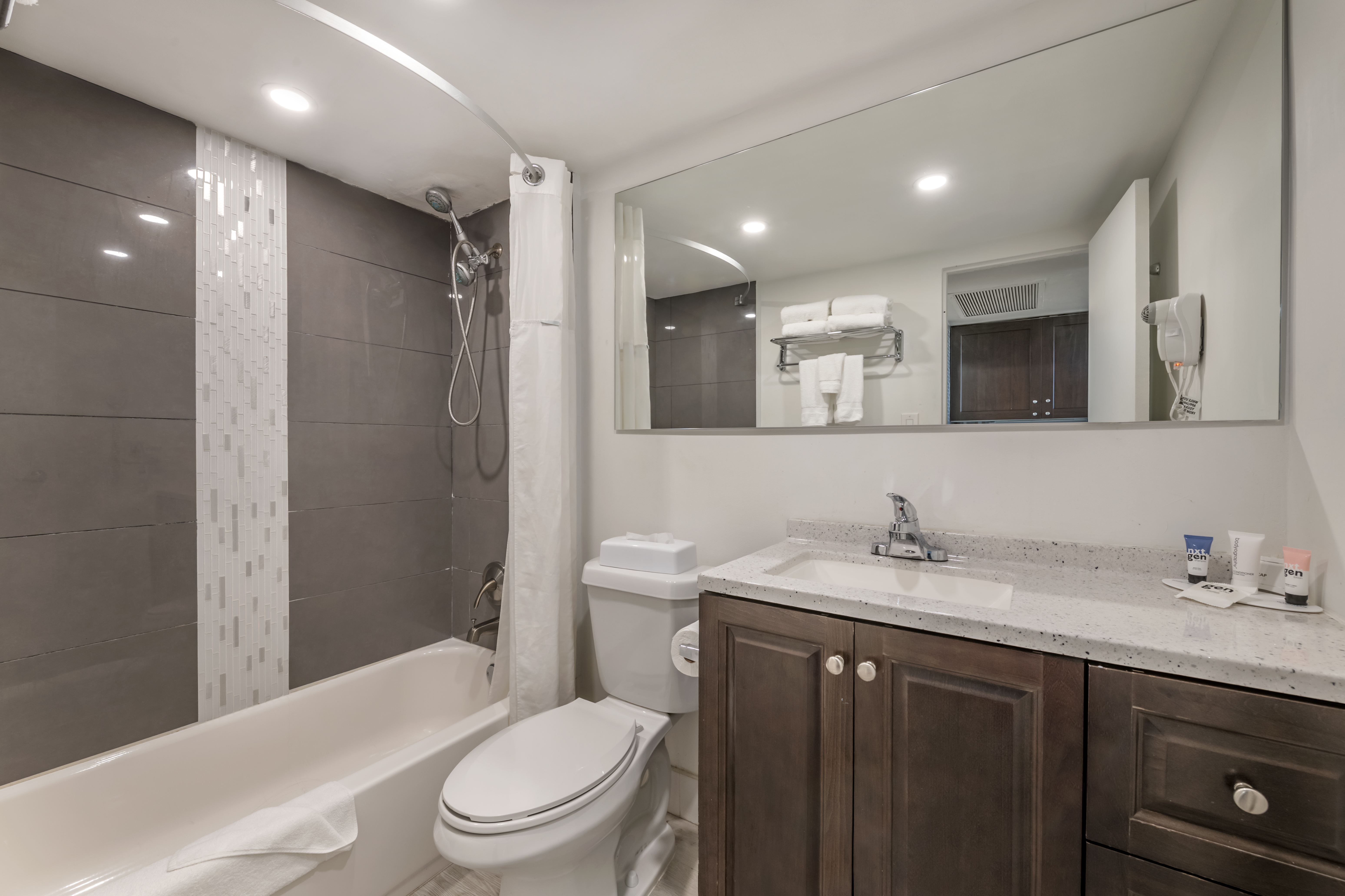 Guest room bath at the Ramada Plaza by Wyndham Marco Polo Beach Resort in Sunny Isles Beach, Florida