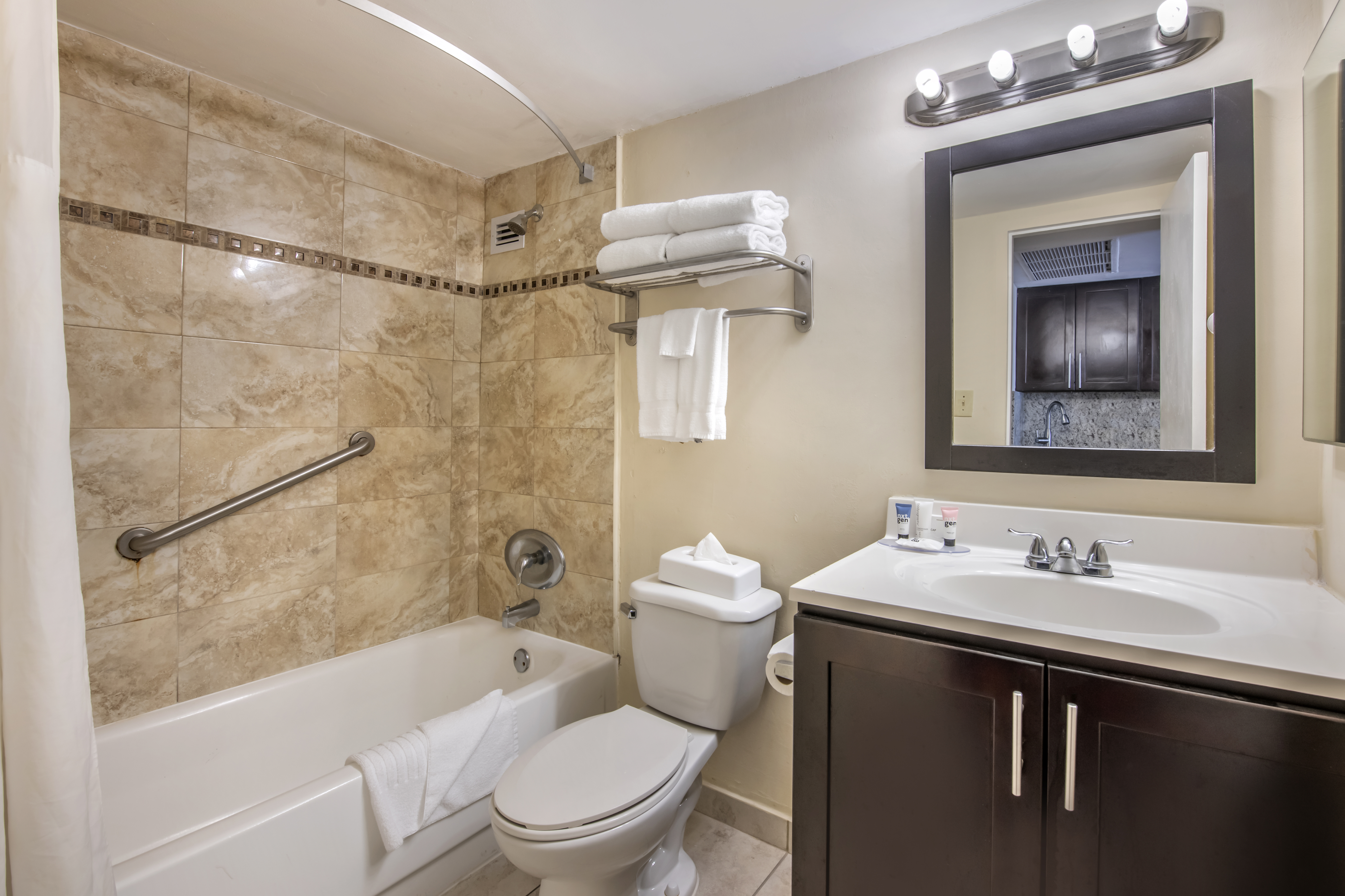 Guest room bath at the Ramada Plaza by Wyndham Marco Polo Beach Resort in Sunny Isles Beach, Florida