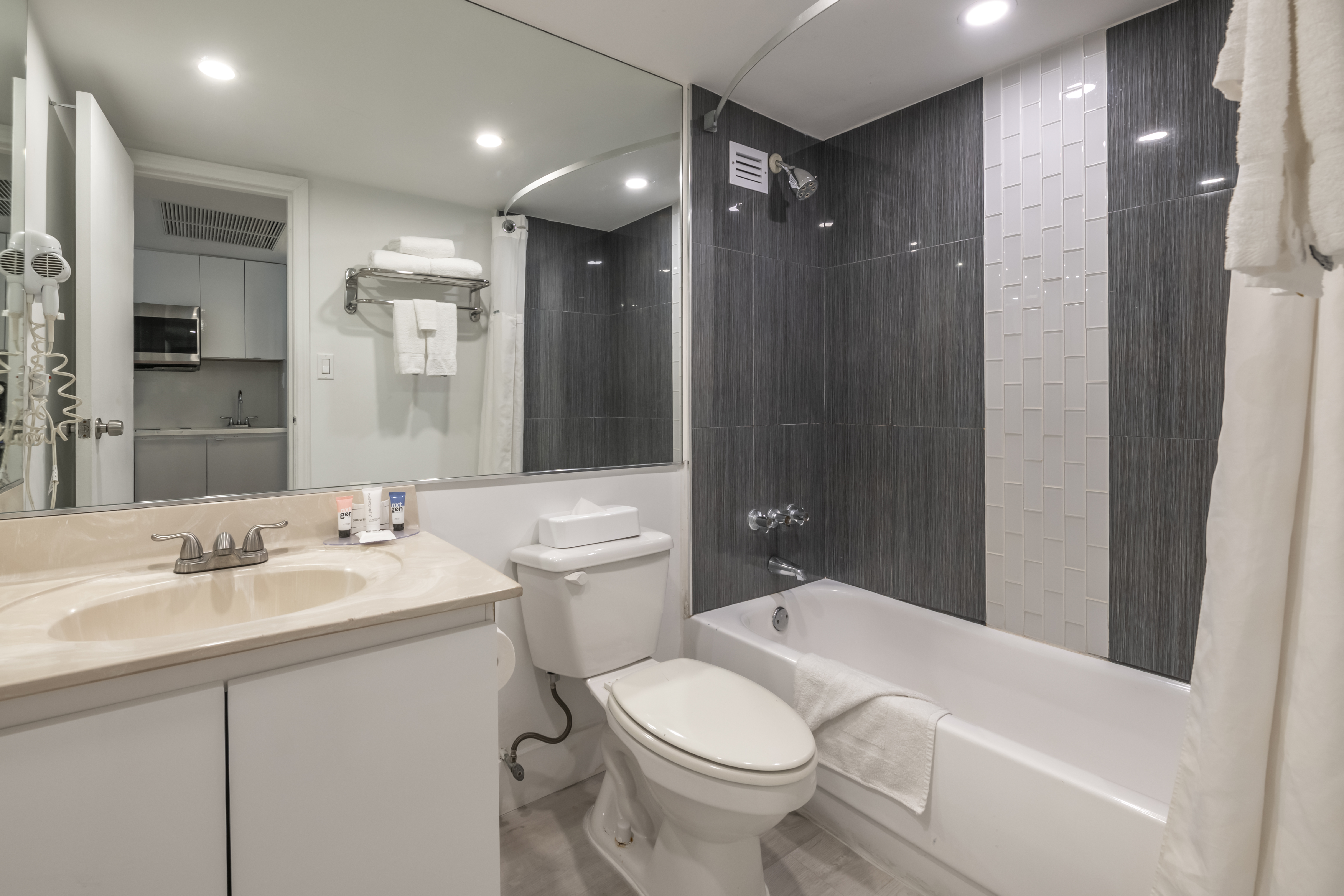 Guest room bath at the Ramada Plaza by Wyndham Marco Polo Beach Resort in Sunny Isles Beach, Florida