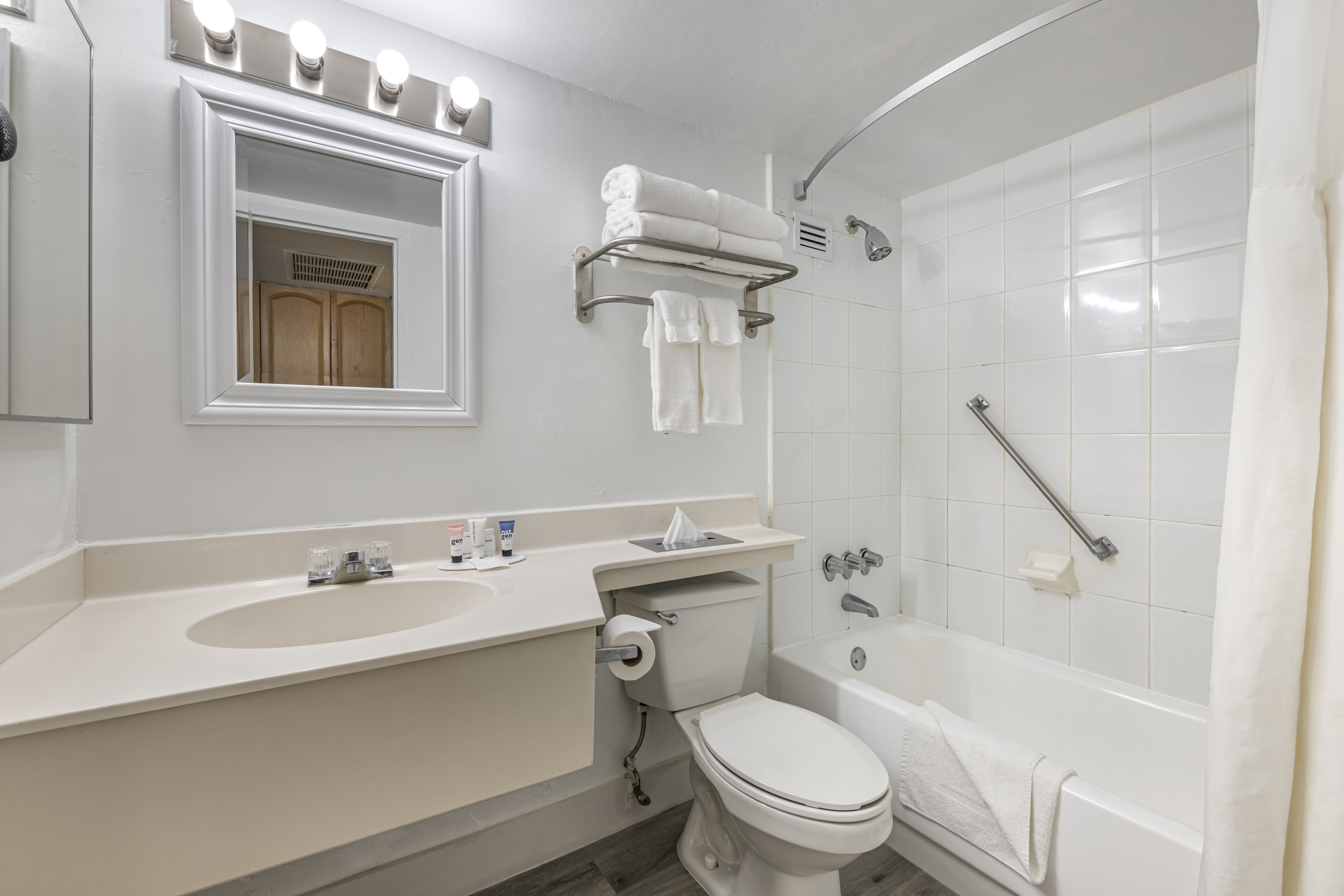 Guest room bath at the Ramada Plaza by Wyndham Marco Polo Beach Resort in Sunny Isles Beach, Florida