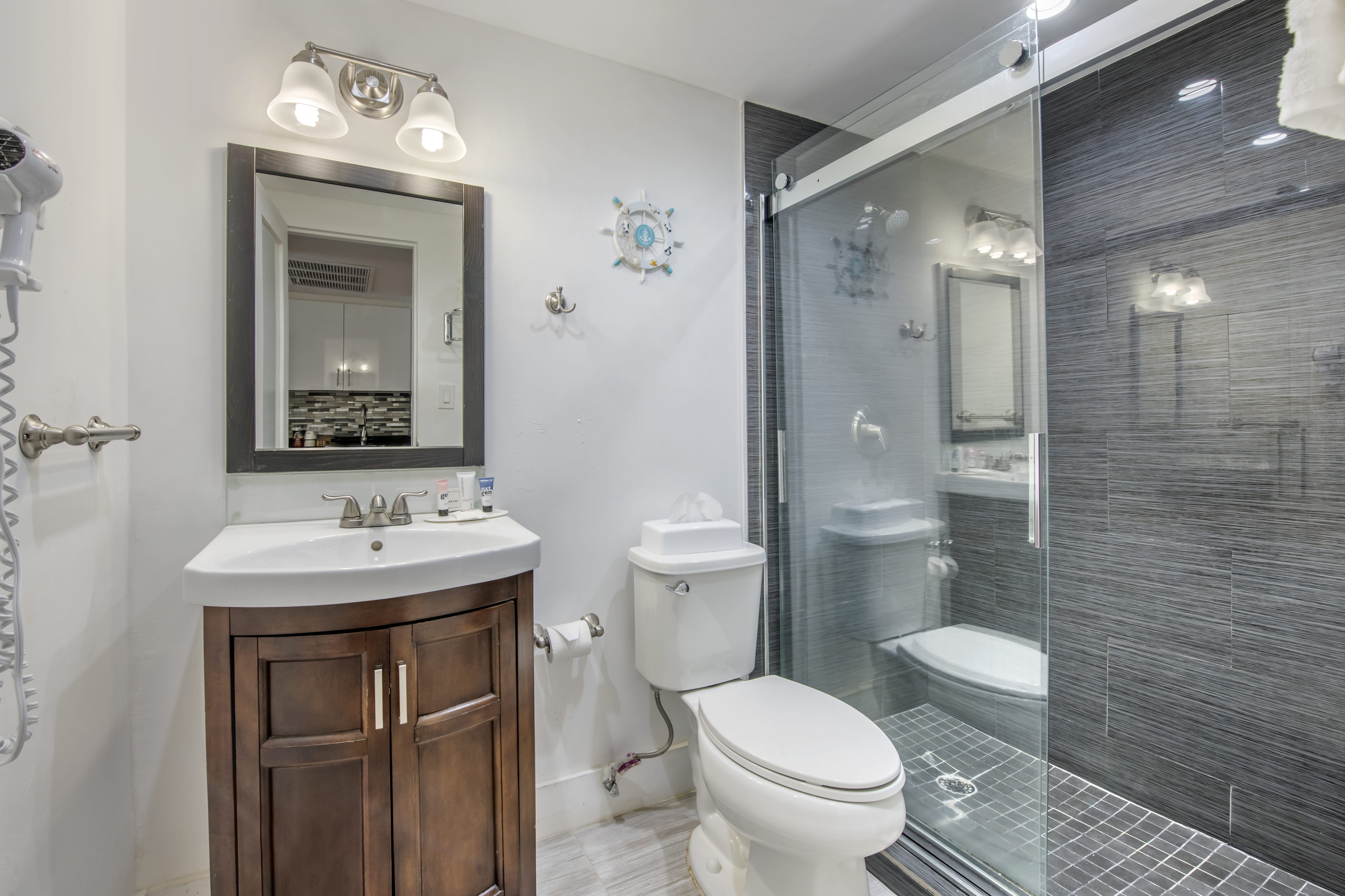 Guest room bath at the Ramada Plaza by Wyndham Marco Polo Beach Resort in Sunny Isles Beach, Florida
