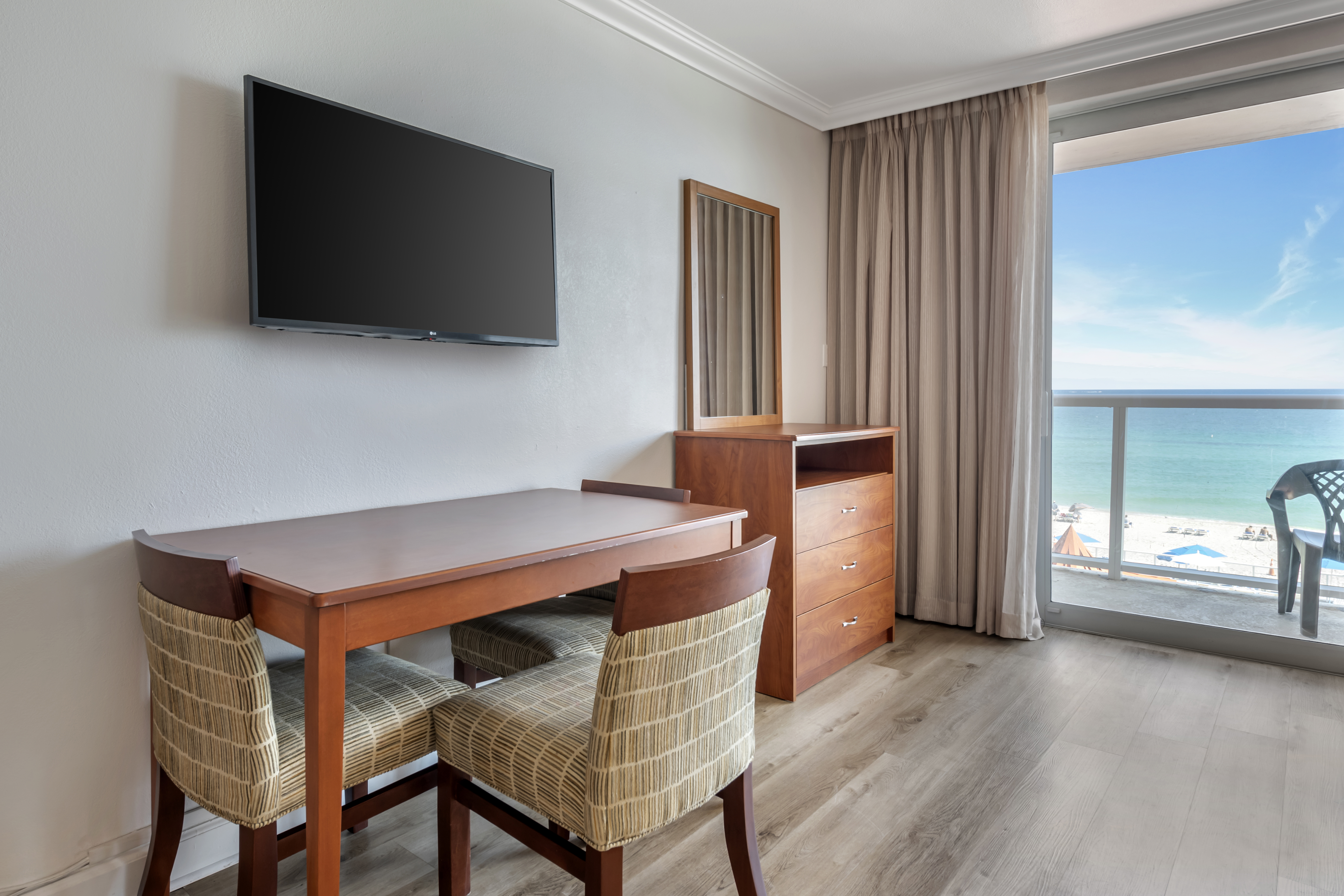 Guest room at the Ramada Plaza by Wyndham Marco Polo Beach Resort in Sunny Isles Beach, Florida