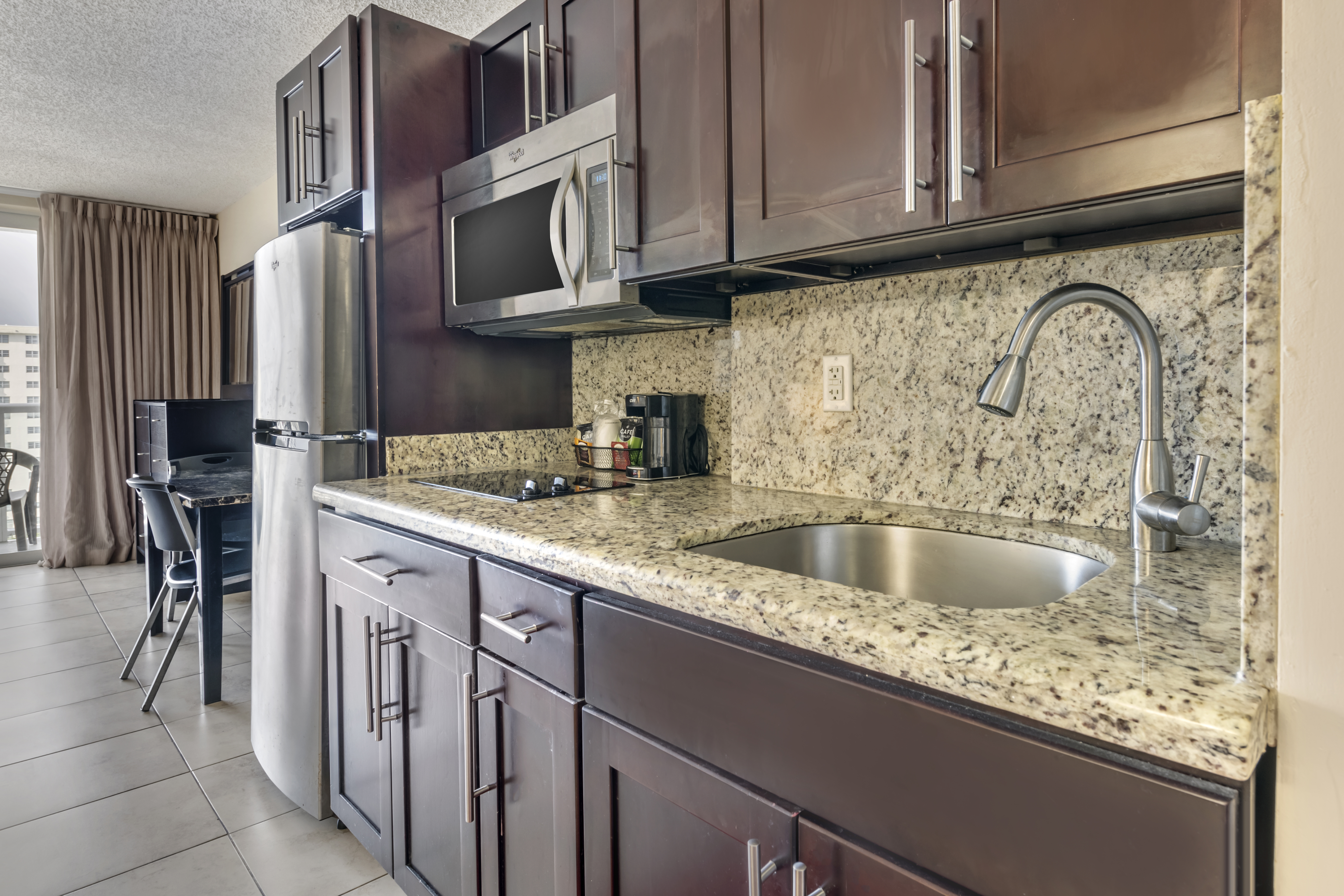 Guest room at the Ramada Plaza by Wyndham Marco Polo Beach Resort in Sunny Isles Beach, Florida