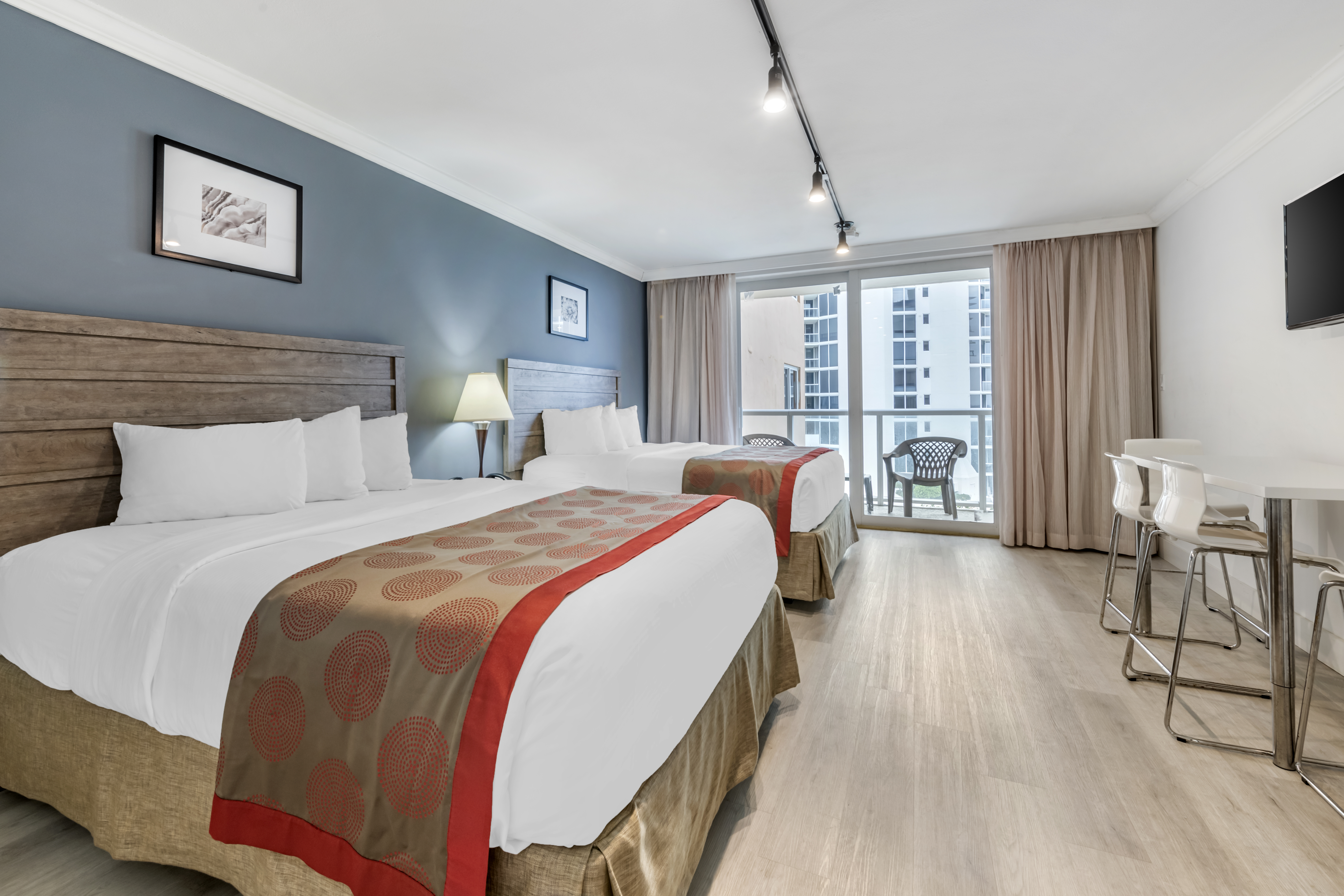 Guest room at the Ramada Plaza by Wyndham Marco Polo Beach Resort in Sunny Isles Beach, Florida