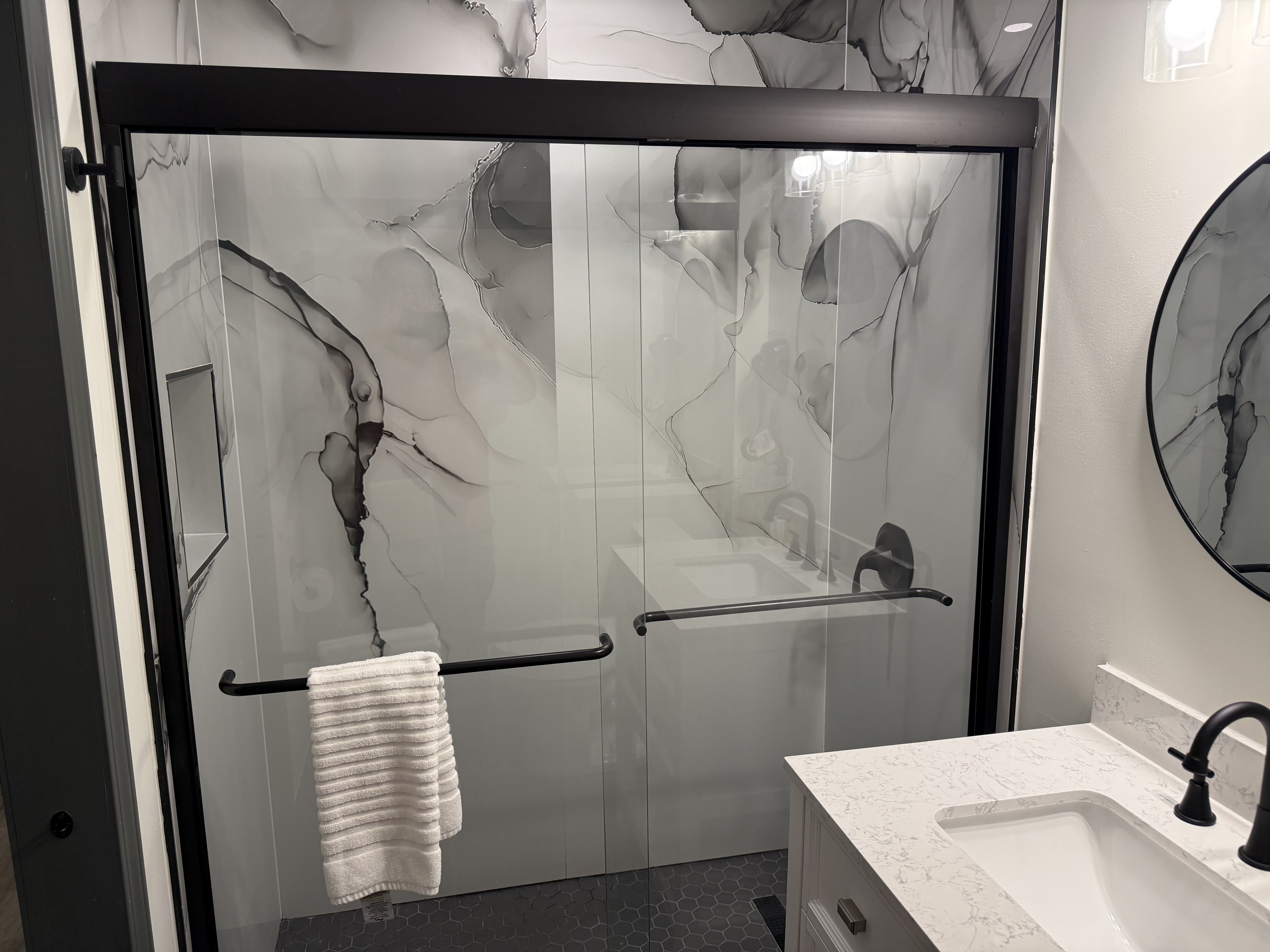 Guest room bath at the Ramada by Wyndham Albany GA in Albany, Georgia