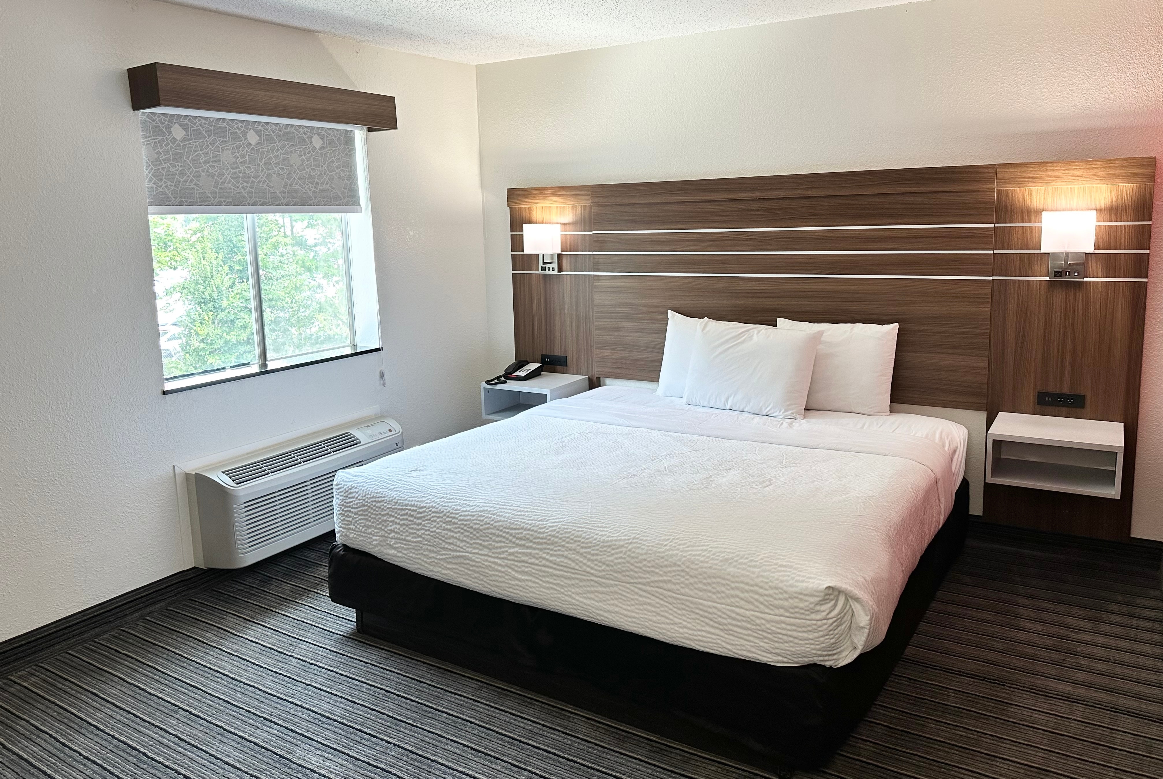 Guest room at the Ramada by Wyndham Lithia Springs Atlanta in Lithia Springs, Georgia