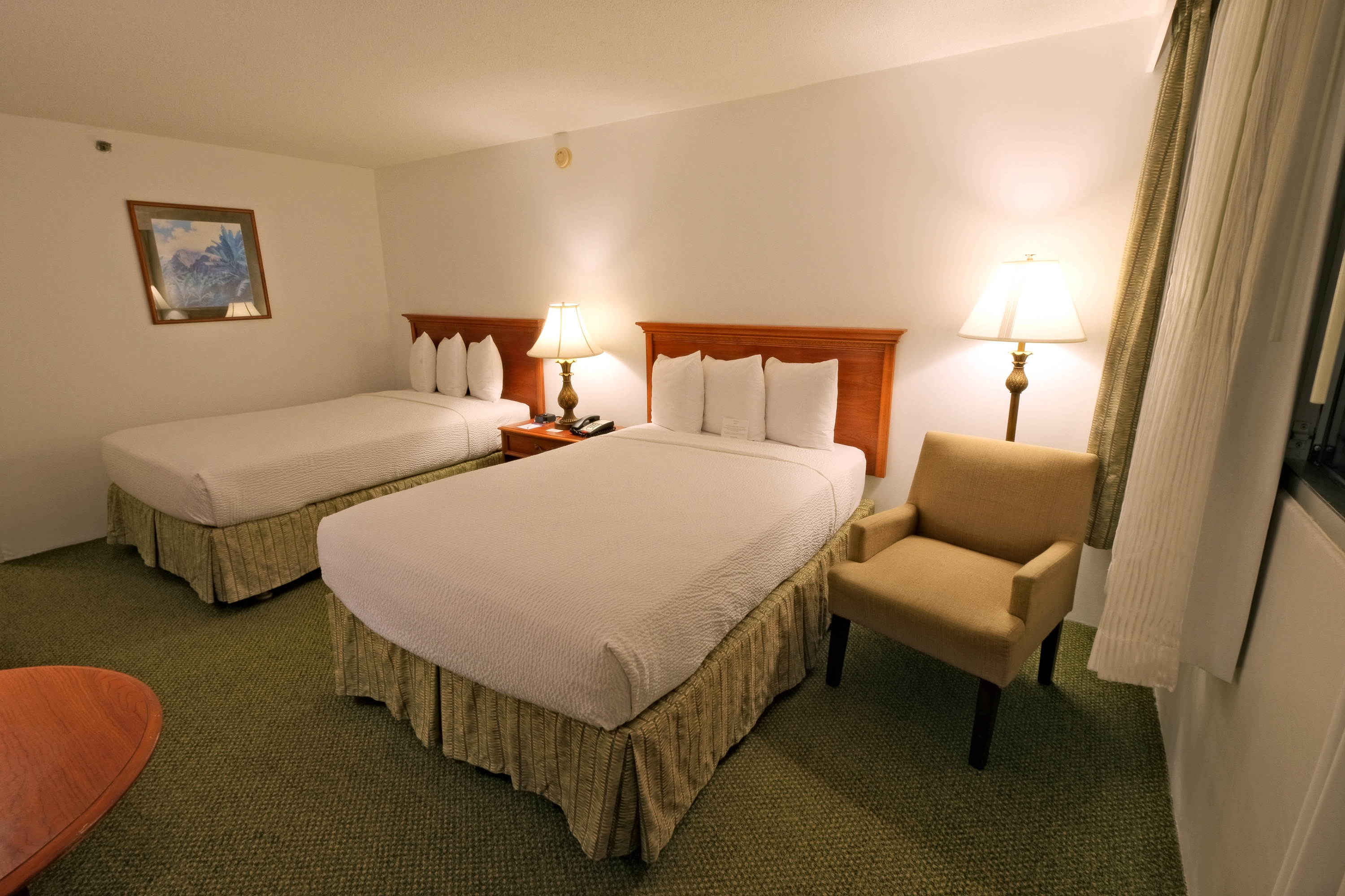 Guest room at the Ramada Plaza by Wyndham Waikiki in Honolulu, Hawaii