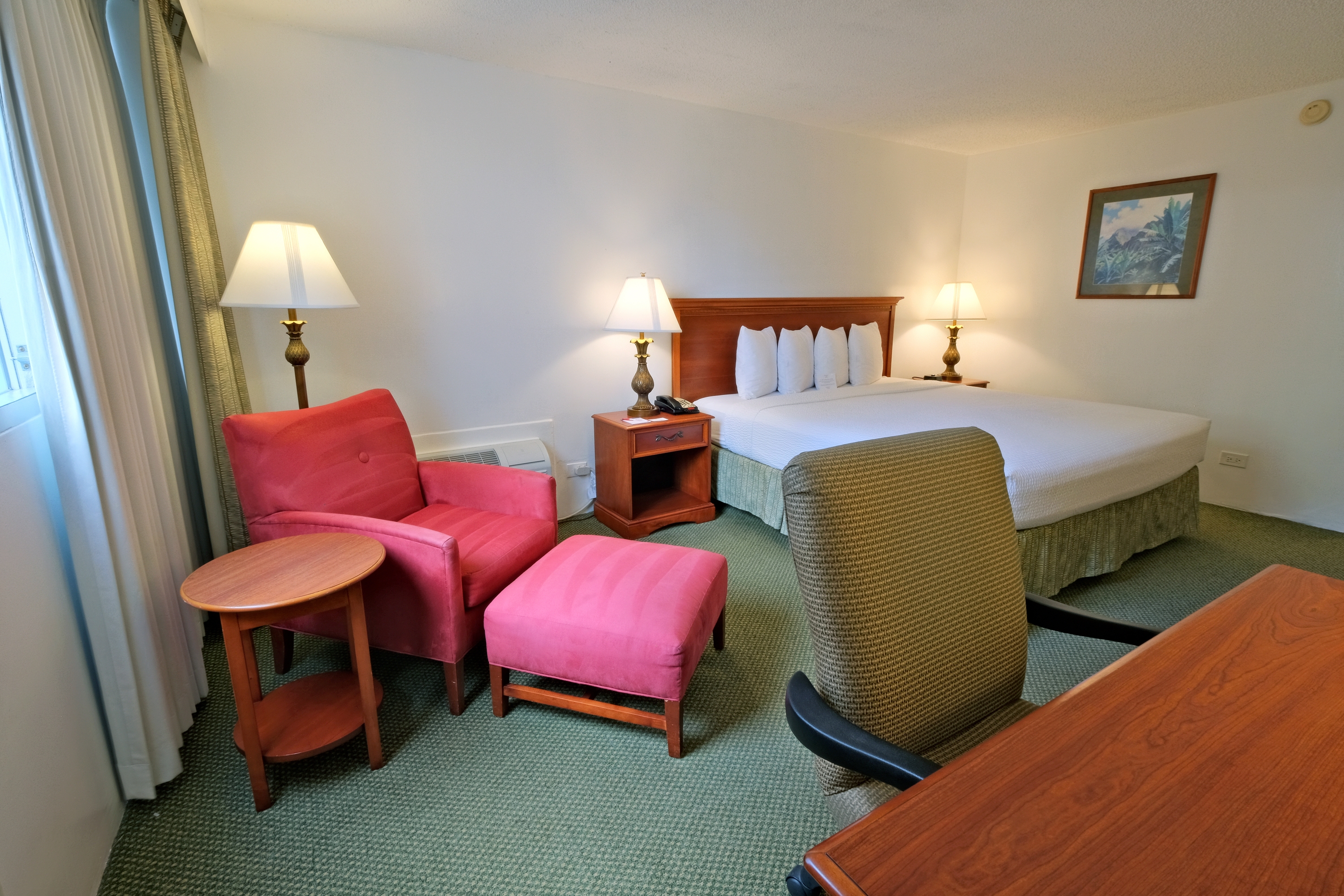 Guest room at the Ramada Plaza by Wyndham Waikiki in Honolulu, Hawaii