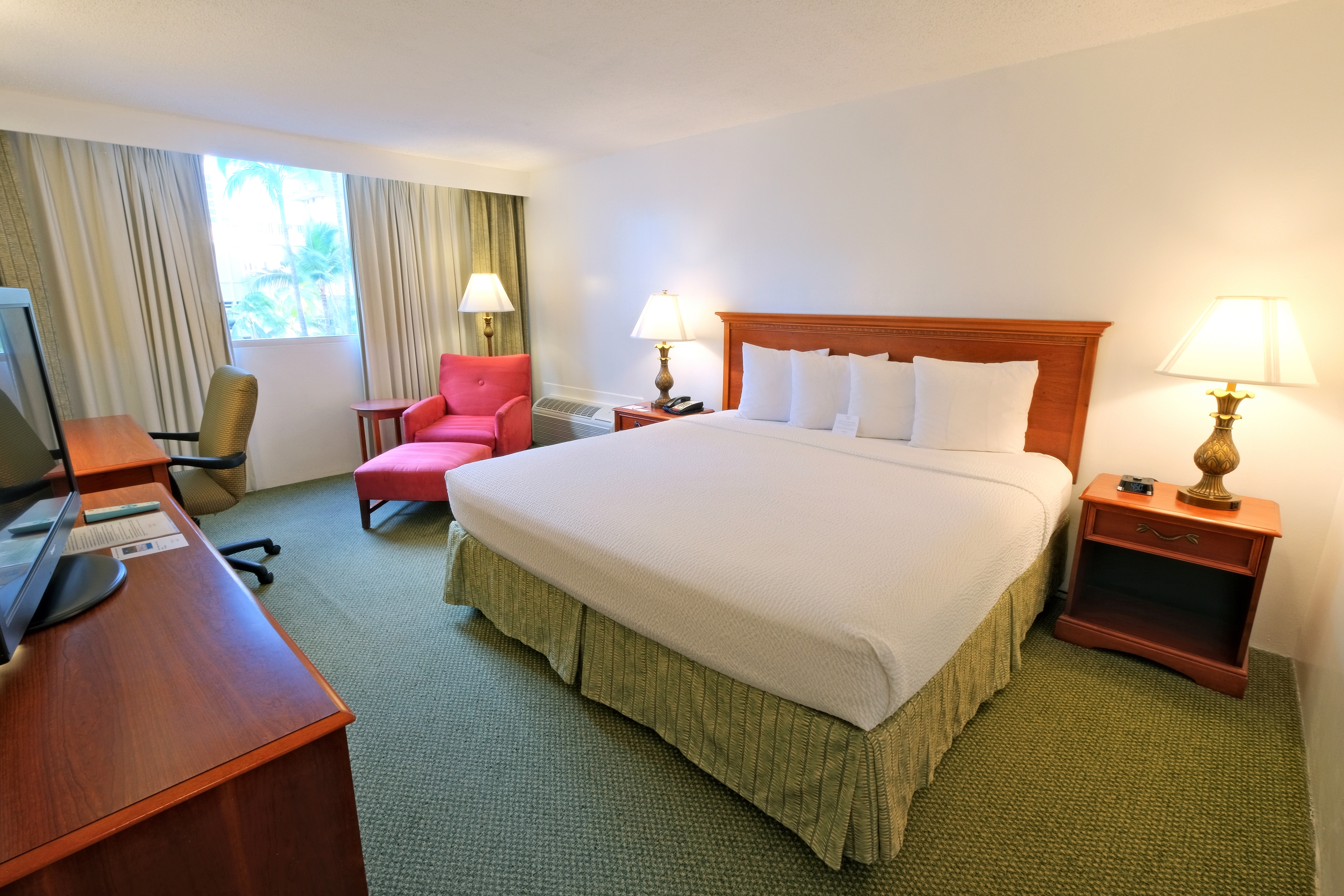 Guest room at the Ramada Plaza by Wyndham Waikiki in Honolulu, Hawaii
