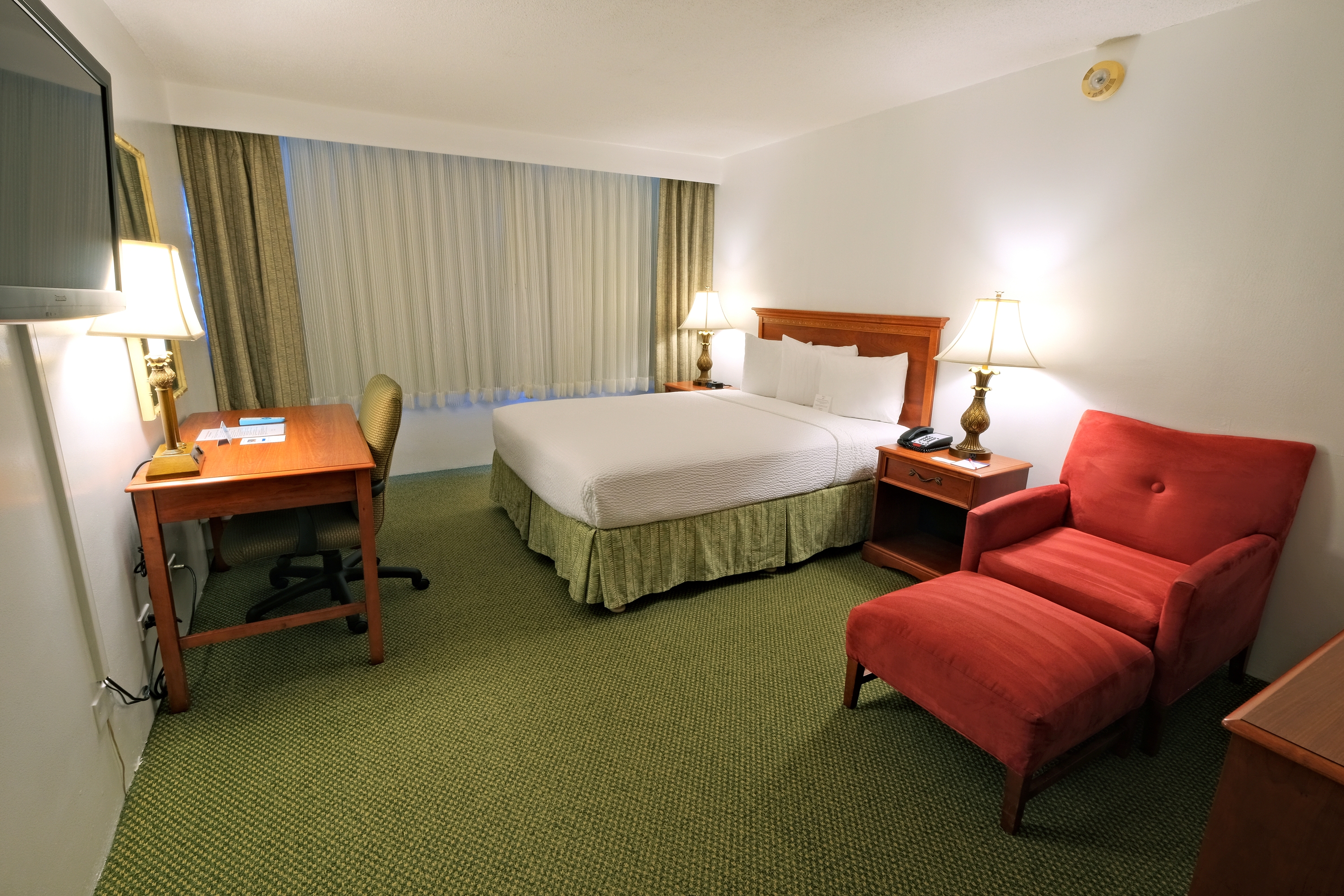 Guest room at the Ramada Plaza by Wyndham Waikiki in Honolulu, Hawaii