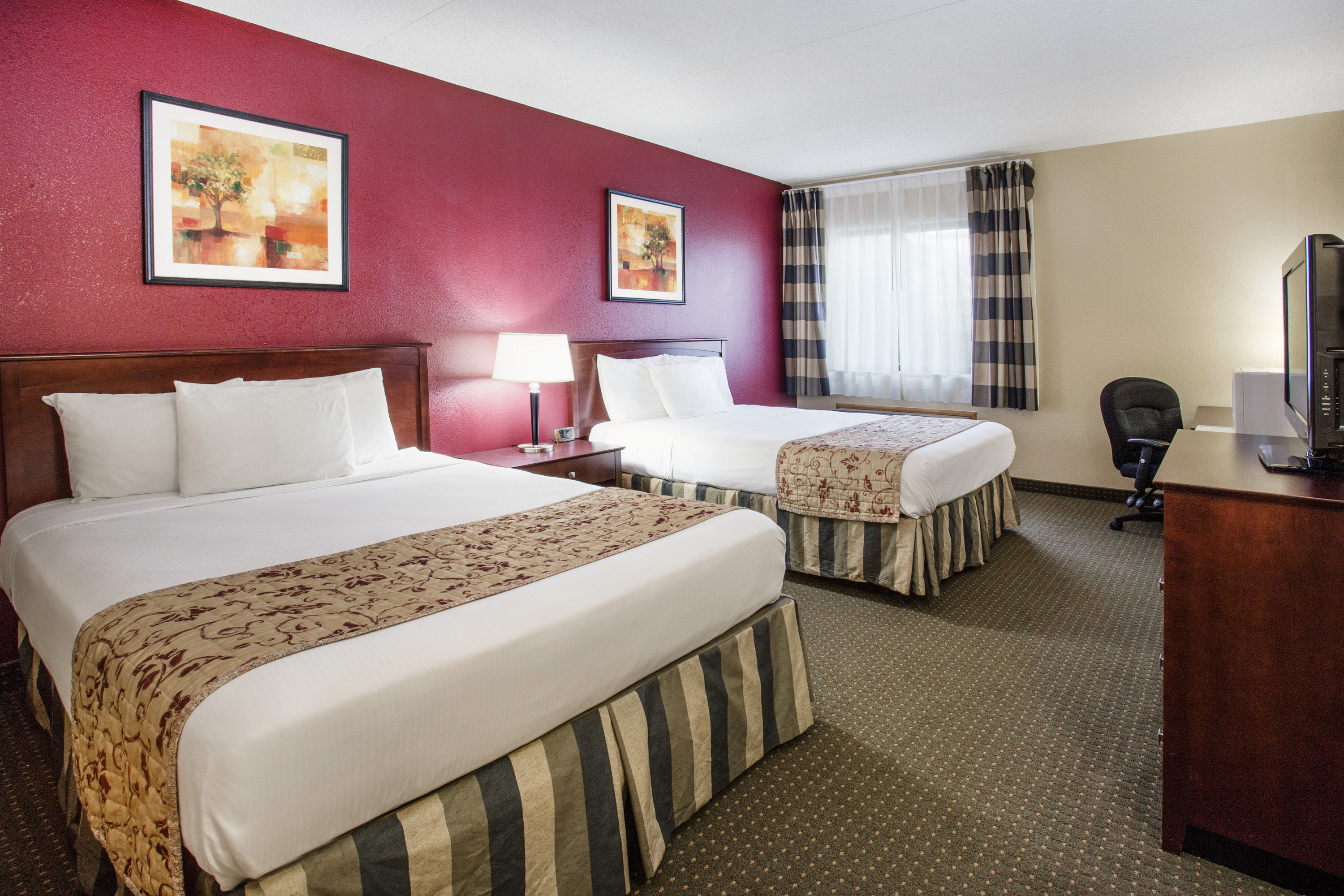 Guest room at the Ramada by Wyndham Bettendorf in Bettendorf, Iowa