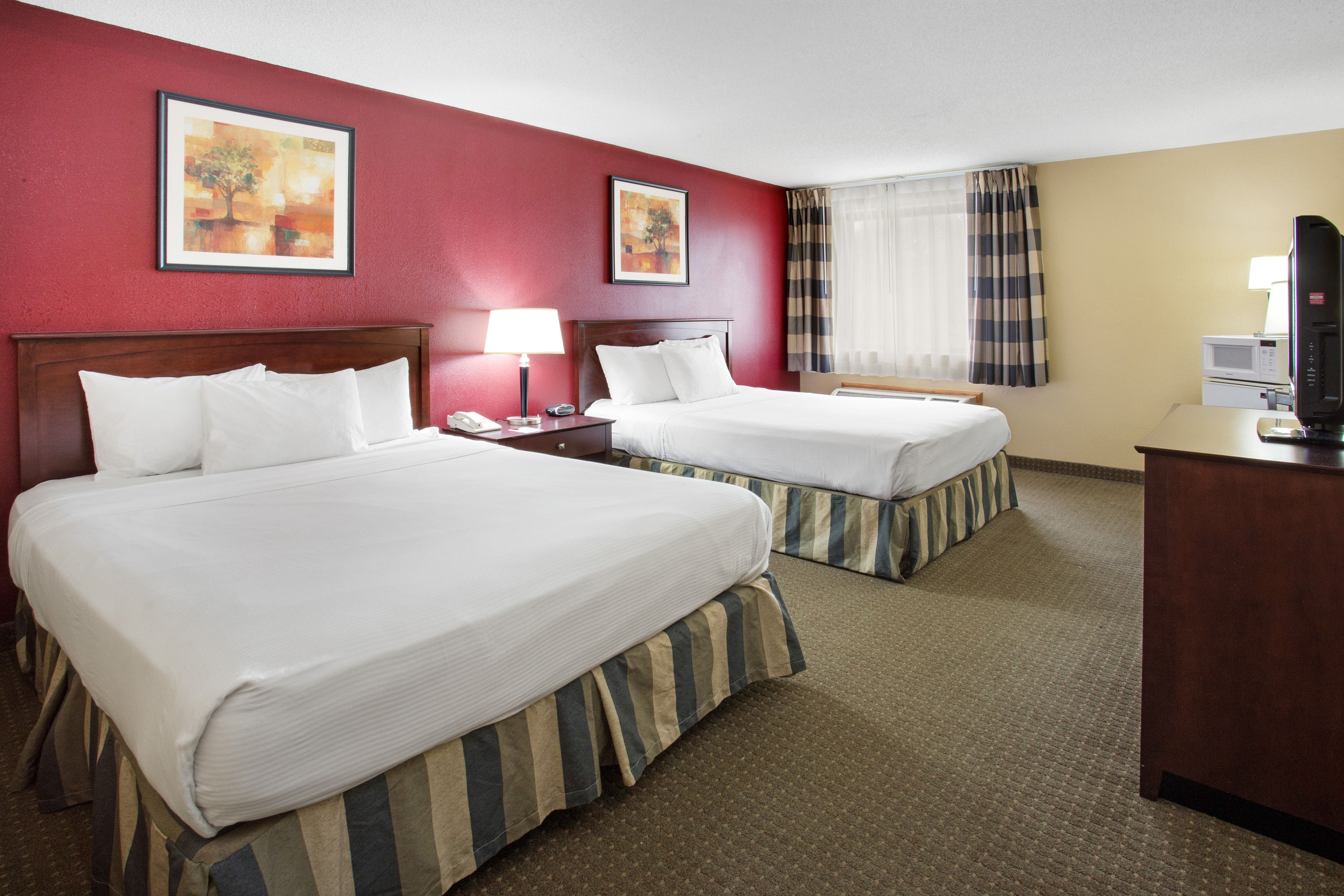 Guest room at the Ramada by Wyndham Bettendorf in Bettendorf, Iowa