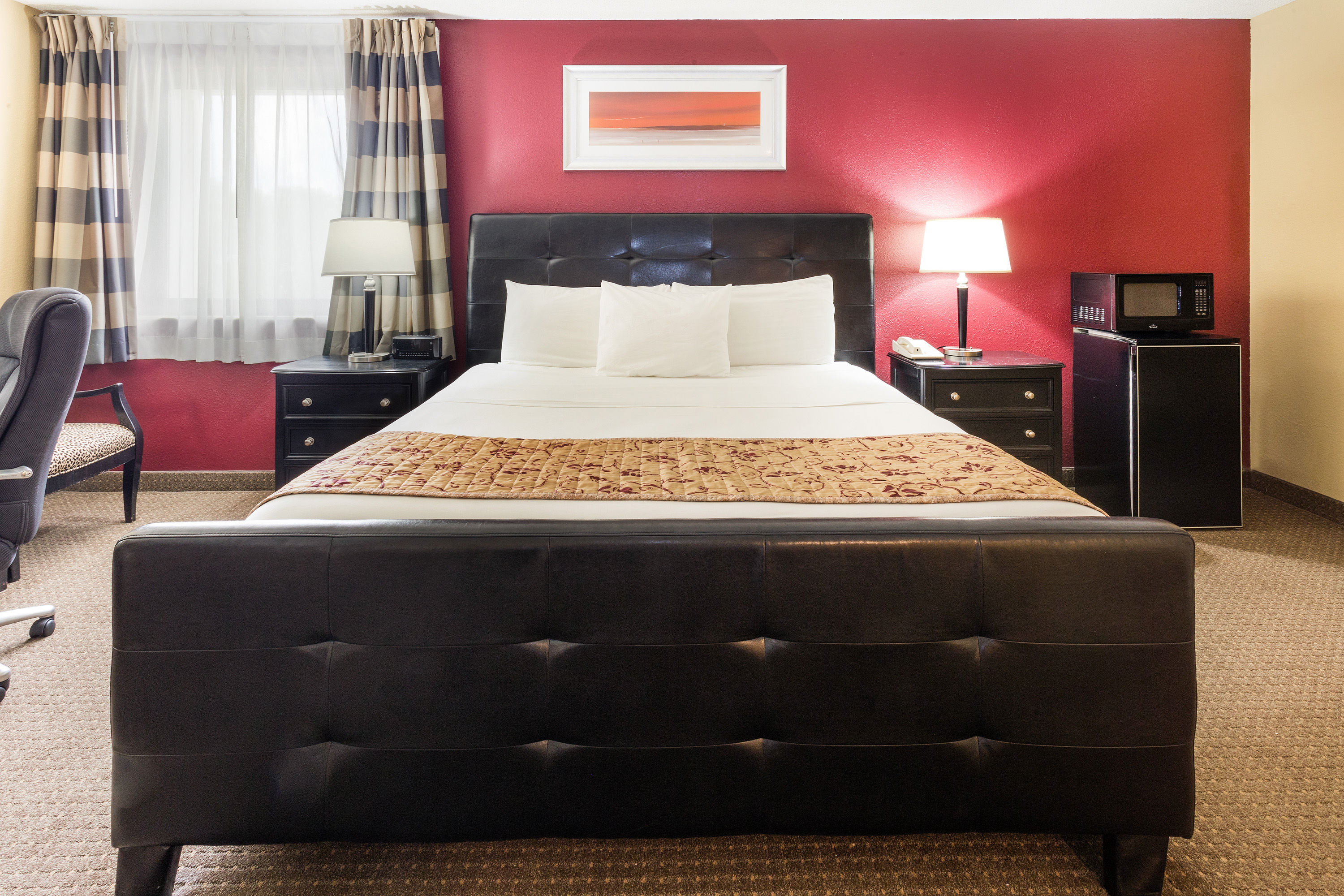 Ramada by Wyndham Bettendorf suite in Bettendorf, Iowa