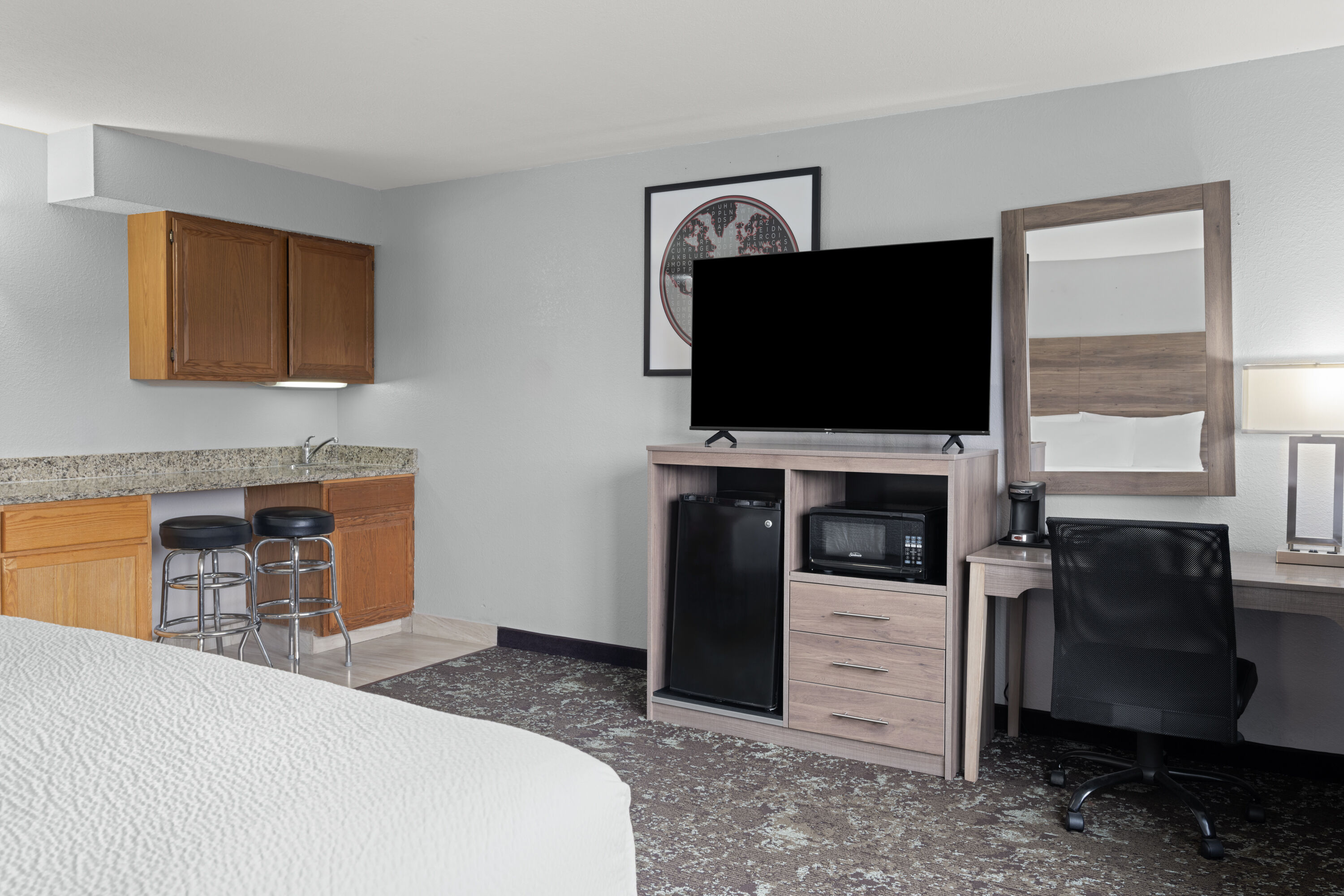 Guest room at the Ramada by Wyndham Cedar Rapids South in Cedar Rapids, Iowa