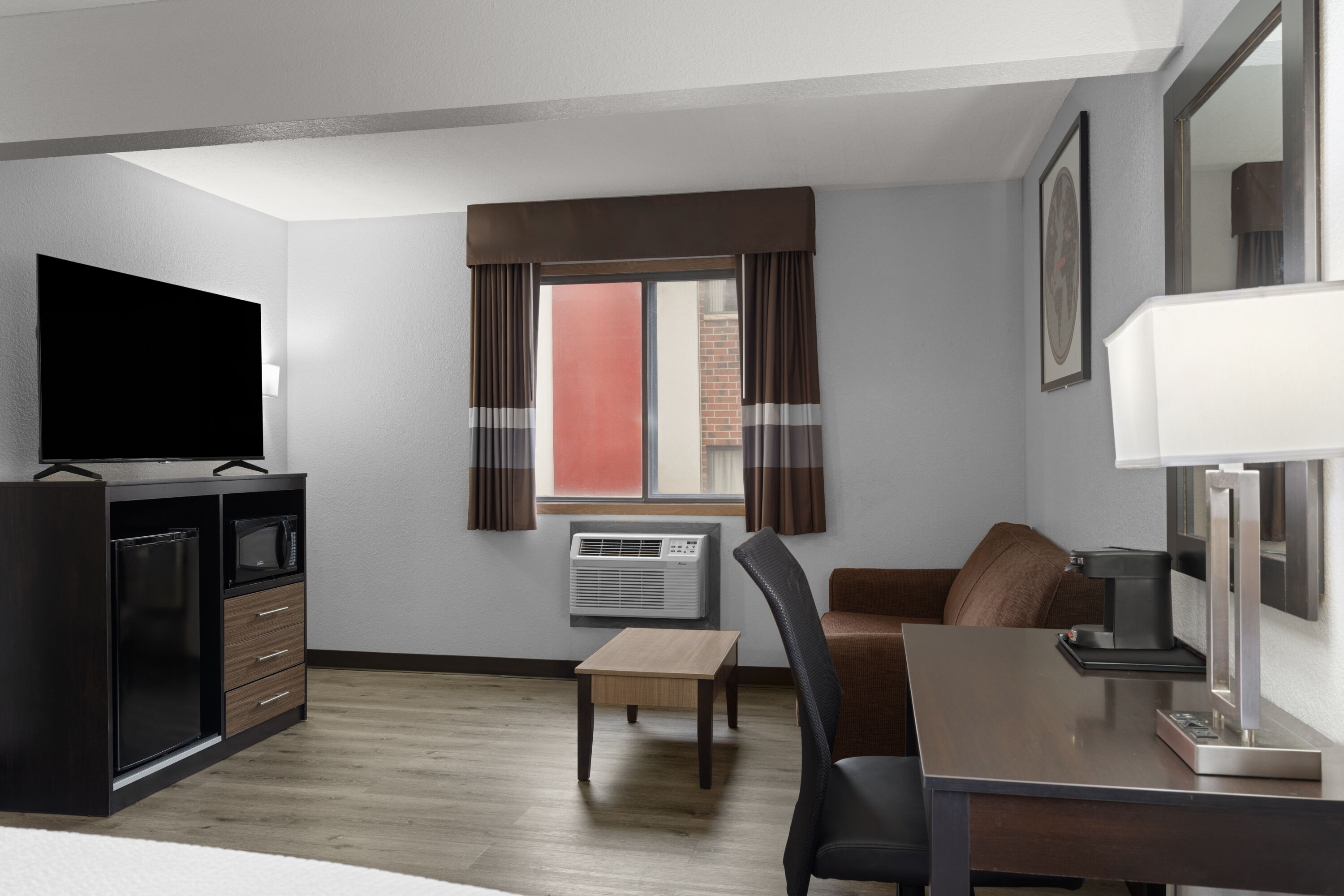 Guest room at the Ramada by Wyndham Cedar Rapids South in Cedar Rapids, Iowa