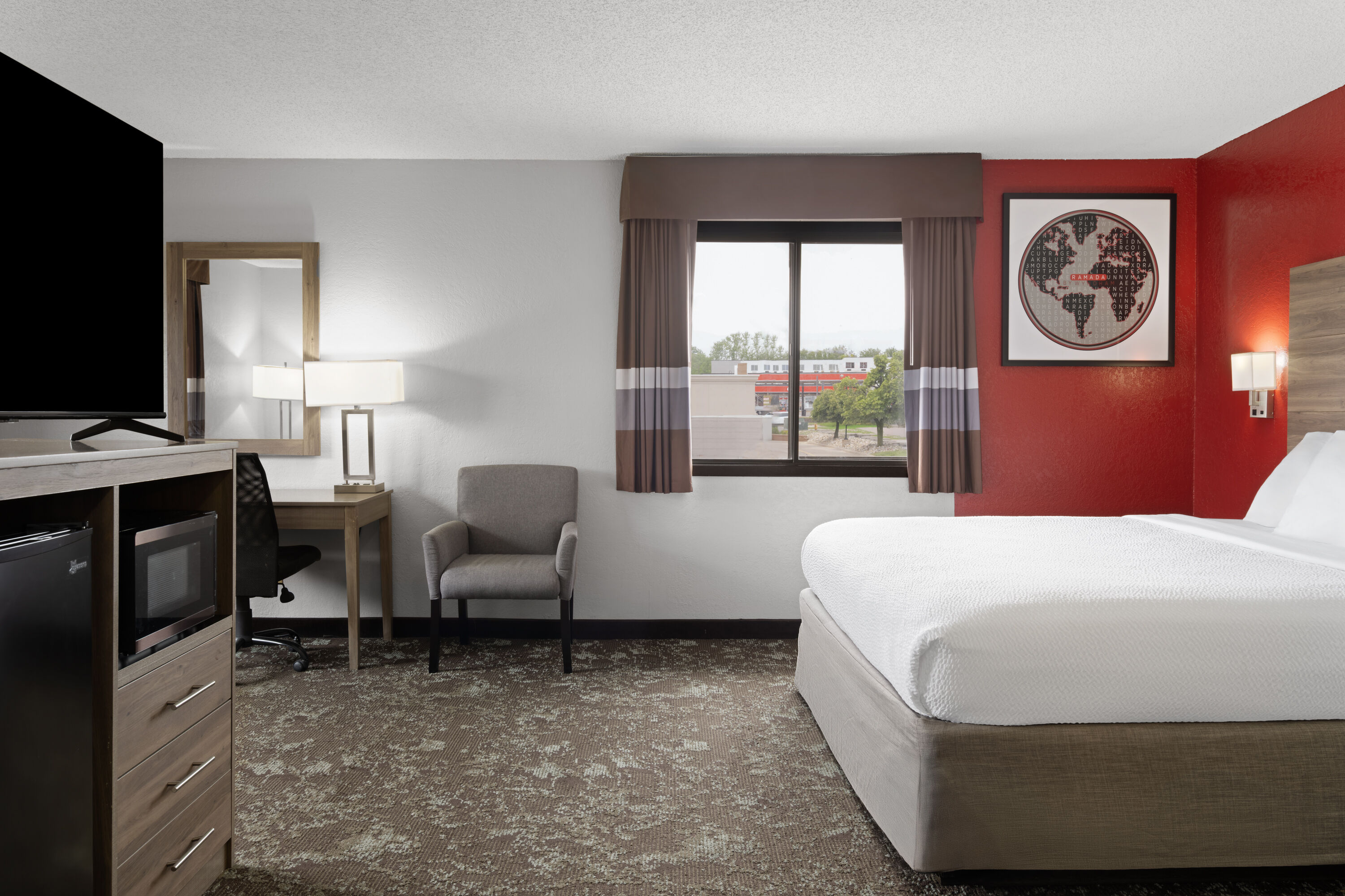 Guest room at the Ramada by Wyndham Cedar Rapids South in Cedar Rapids, Iowa