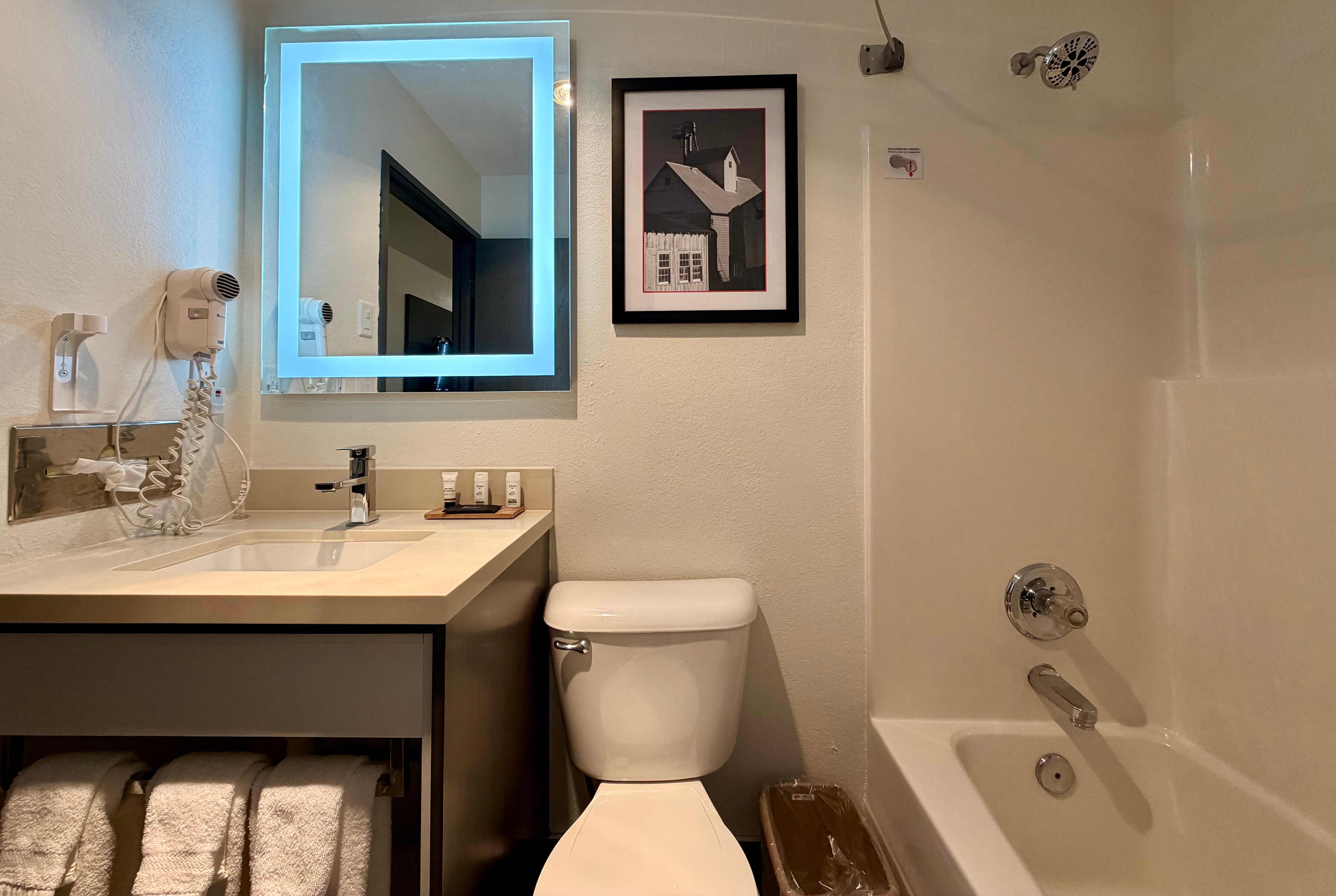 Guest room bath at the Ramada Limited Bloomington in Bloomington, Illinois