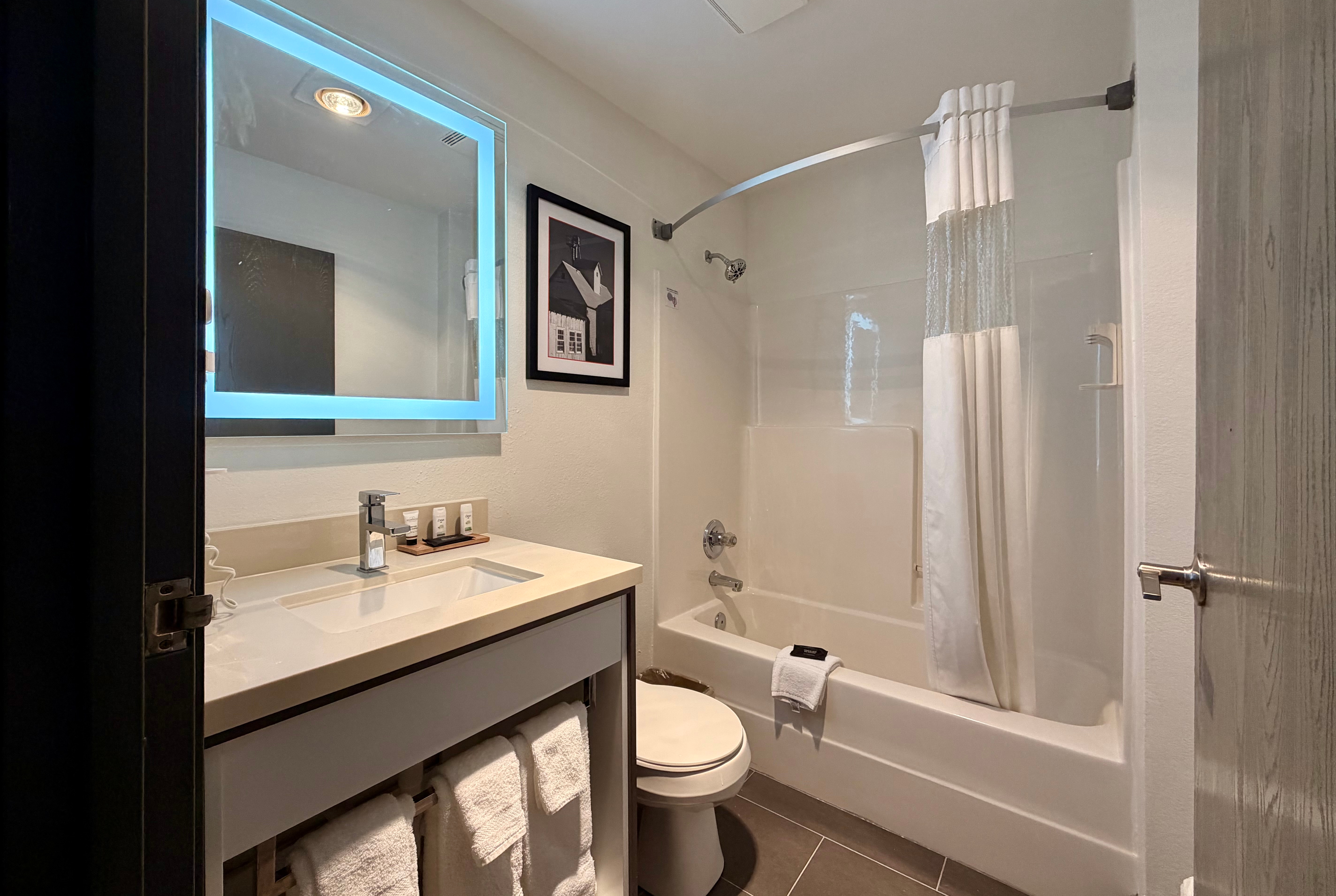 Guest room bath at the Ramada Limited Bloomington in Bloomington, Illinois