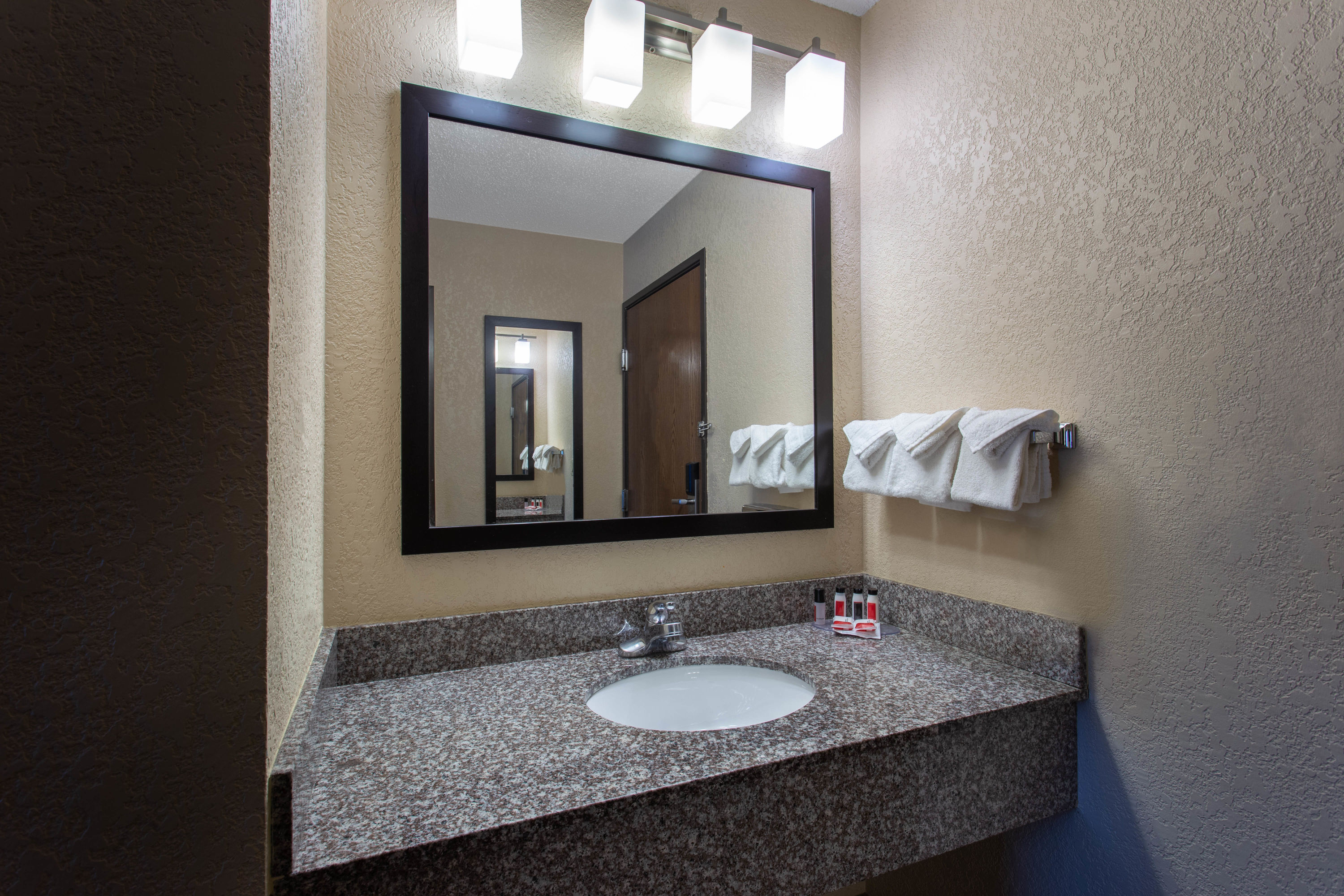 Guest room bath at the Ramada by Wyndham Glendale Heights/Lombard in Glendale Heights, Illinois