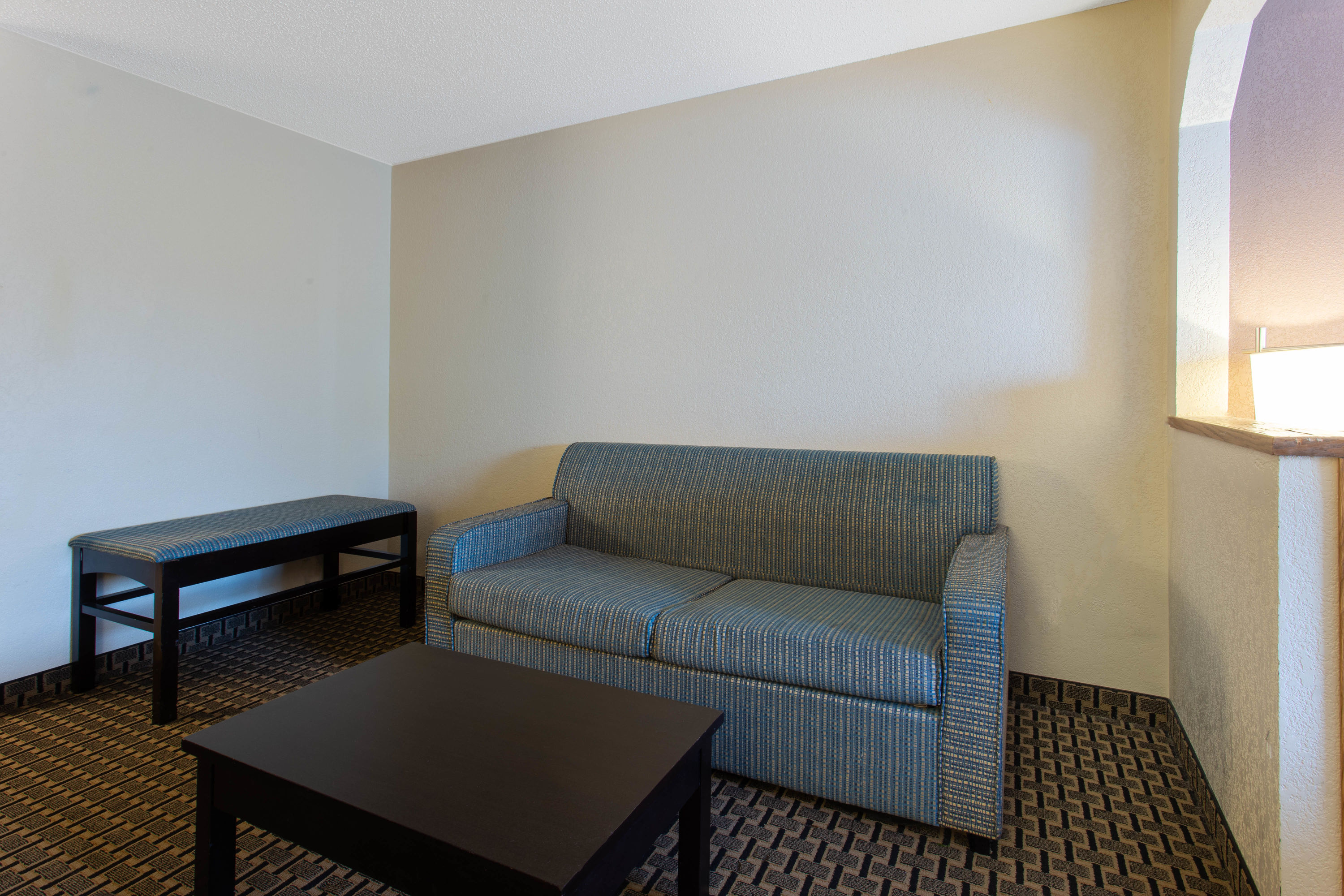 Ramada by Wyndham Glendale Heights/Lombard suite living room in Glendale Heights, Illinois