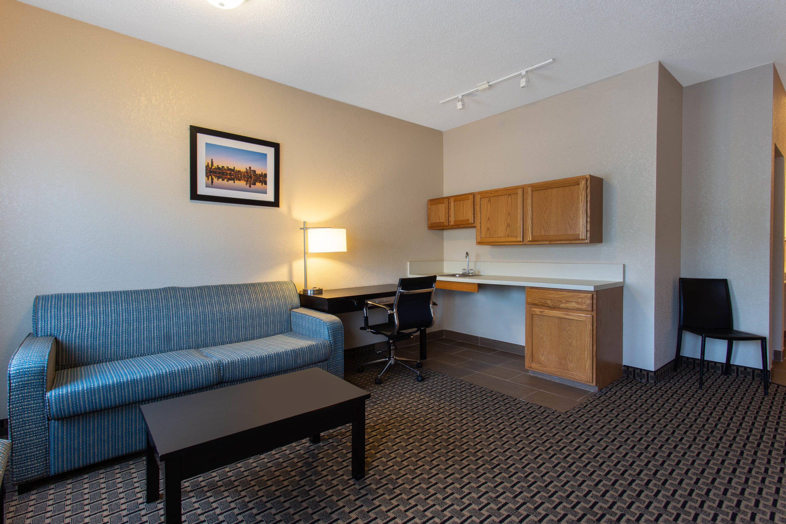 Ramada by Wyndham Glendale Heights/Lombard suite living room in Glendale Heights, Illinois
